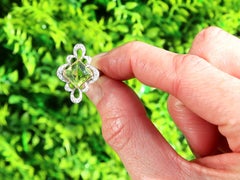 Antique 2.44 Carat Peridot and 0.18 Carat Diamond Platinum Ring Circa 1910