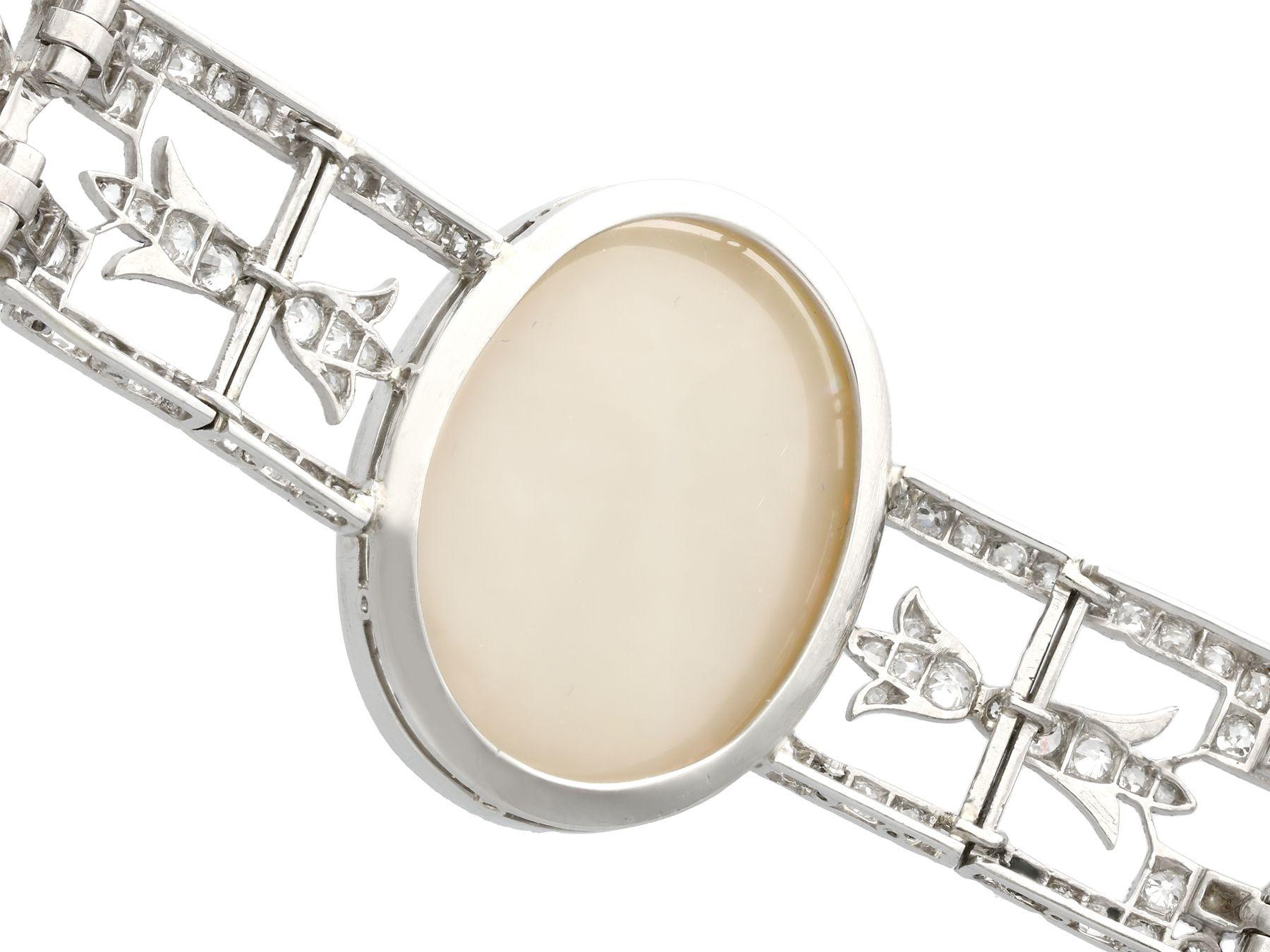 Cabochon Antique 24.66Ct Oval Cut Opal and 9.81Ct Diamond Platinum Bracelet For Sale