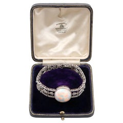Bracciale antico in platino con opale taglio ovale da 24,66 carati e diamante da 9,81 carati