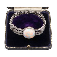 Pulsera antigua de platino con ópalo talla oval de 24,66 qt y diamantes de 9,81 qt