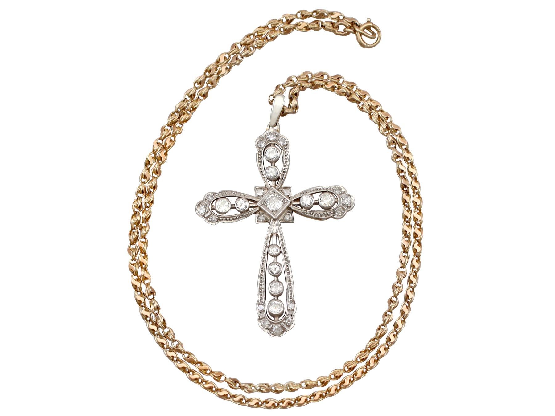 An impressive large antique 2.48 carat diamond and 18 carat yellow gold, 18 carat white gold set cross pendant; part of our diverse antique jewellery and estate jewelry collections.

This fine and impressive large antique pendant has been crafted in