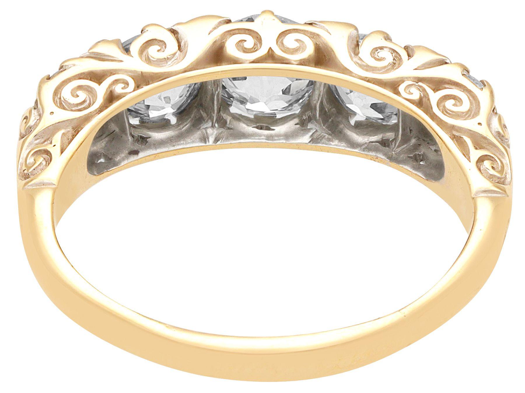 A stunning, fine and impressive antique 2.52 carat diamond, 15 karat yellow gold and silver set five stone ring; part of our antique estate jewelry collections.

This stunning antique Edwardian 5 stone diamond ring has been crafted in 15k yellow