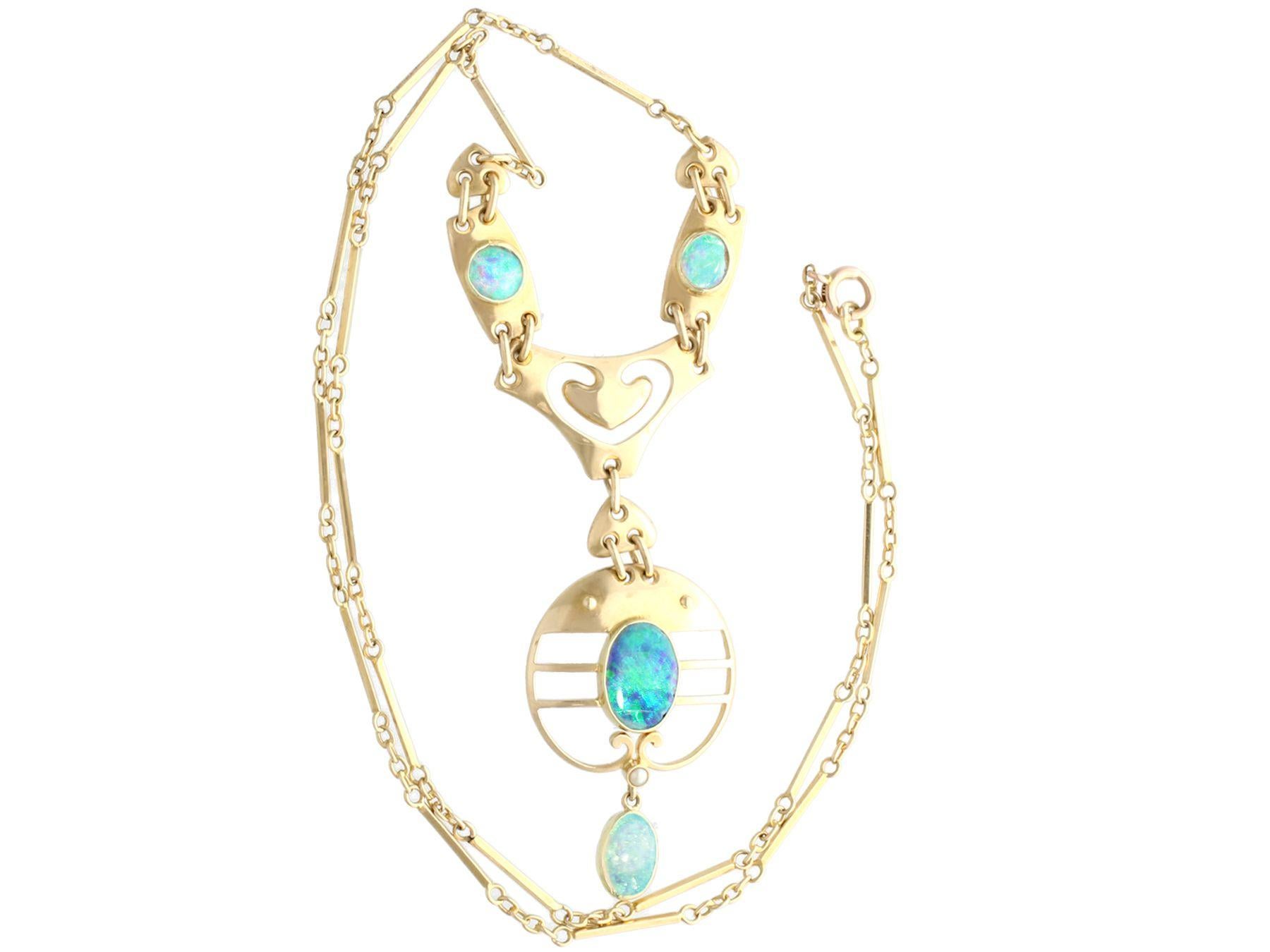 A fine and impressive antique Art Nouveau 2.62 carat opal and 15 karat yellow gold necklace made by Murrle Bennet & Co; part of our diverse antique jewelry and estate jewelry collections

This fine and impressive antique necklace has been crafted in