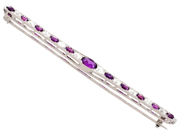 A stunning, fine and impressive antique 2.63 carat amethyst and 2.24 carat diamond, 15k white gold bar brooch; part of our diverse antique jewelry collections.

This stunning, fine and impressive antique amethyst brooch has been crafted in 15k white