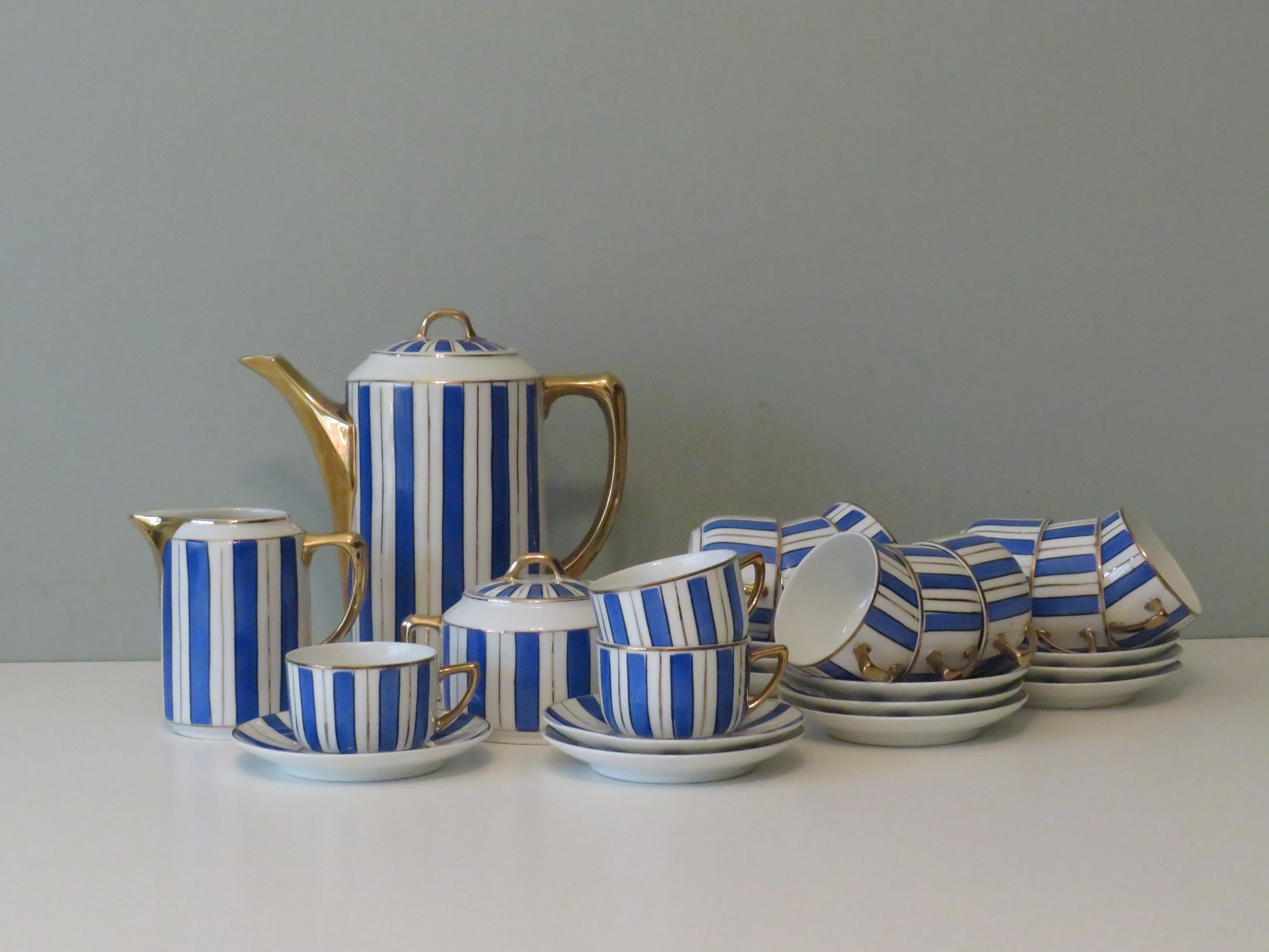Heavily gilded and hand-painted Belle Epoque coffee service by De Fuisseaux, Baudour Belgium. Each part of the service is stamped and the stamp can be used to date it between 1847 and 1934.
There are 12 coffee cups with saucers, a milk jug, a sugar