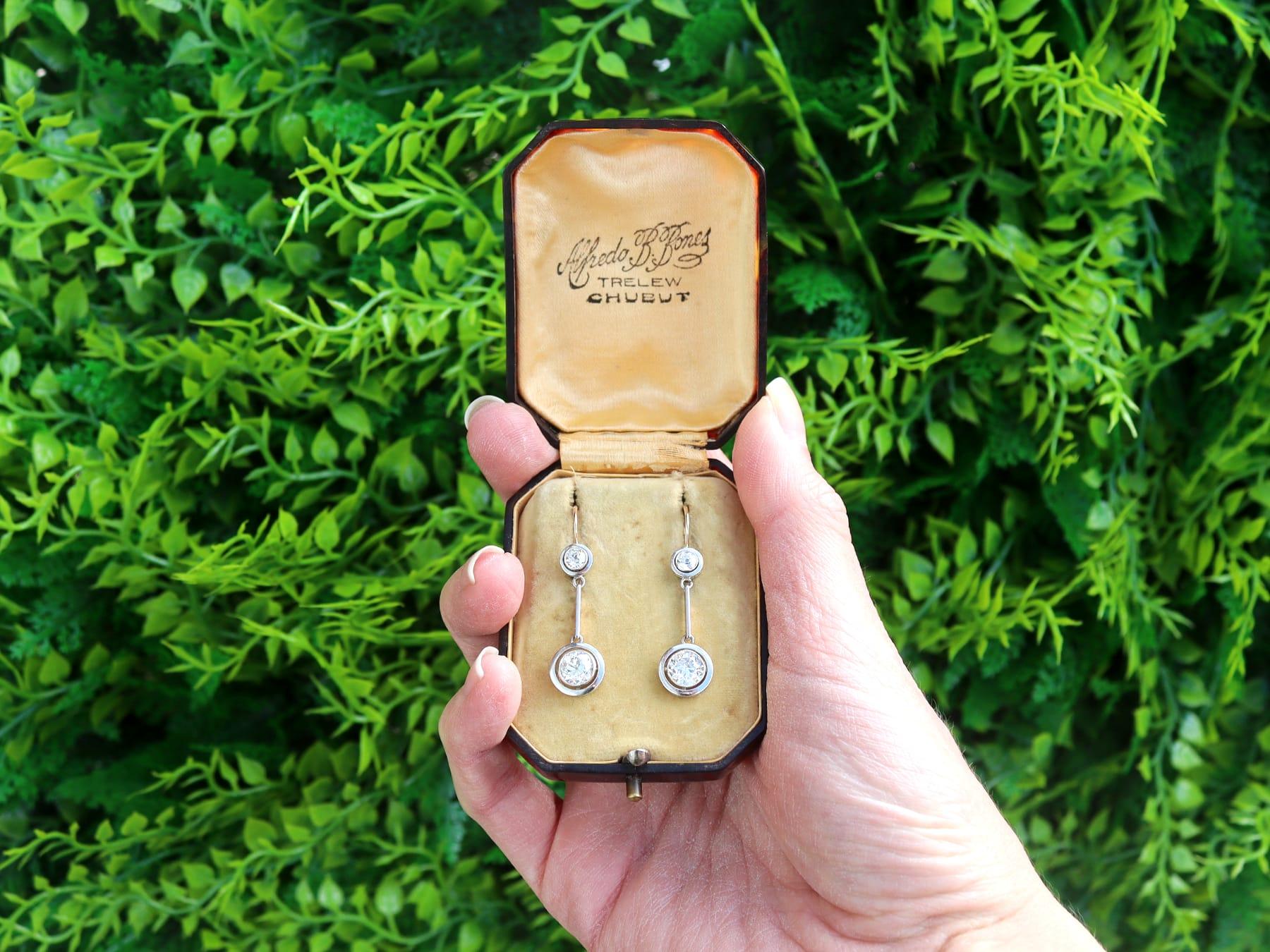 A stunning, fine and impressive pair of antique 2.75 carat diamond and 15 karat yellow gold, platinum set drop earrings - boxed; part of our diverse antique jewelry collections

These stunning, fine and impressive antique drop earrings have been