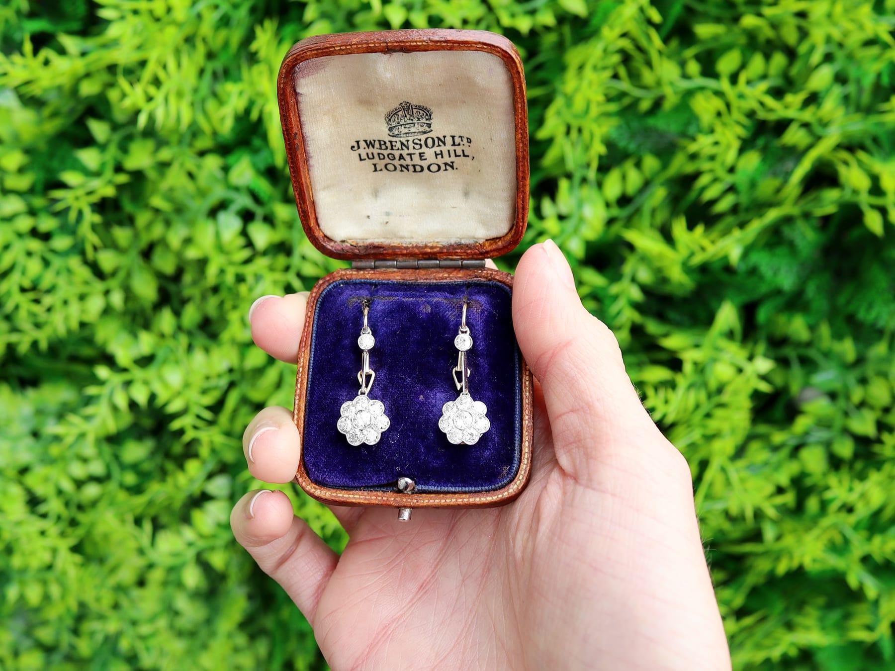 A stunning, fine and impressive pair of antique 2.75 carat diamond, 15 karat yellow gold, platinum set drop earrings; part of our antique jewelry and estate jewelry collections

These stunning, fine and impressive diamond drop earrings are crafted