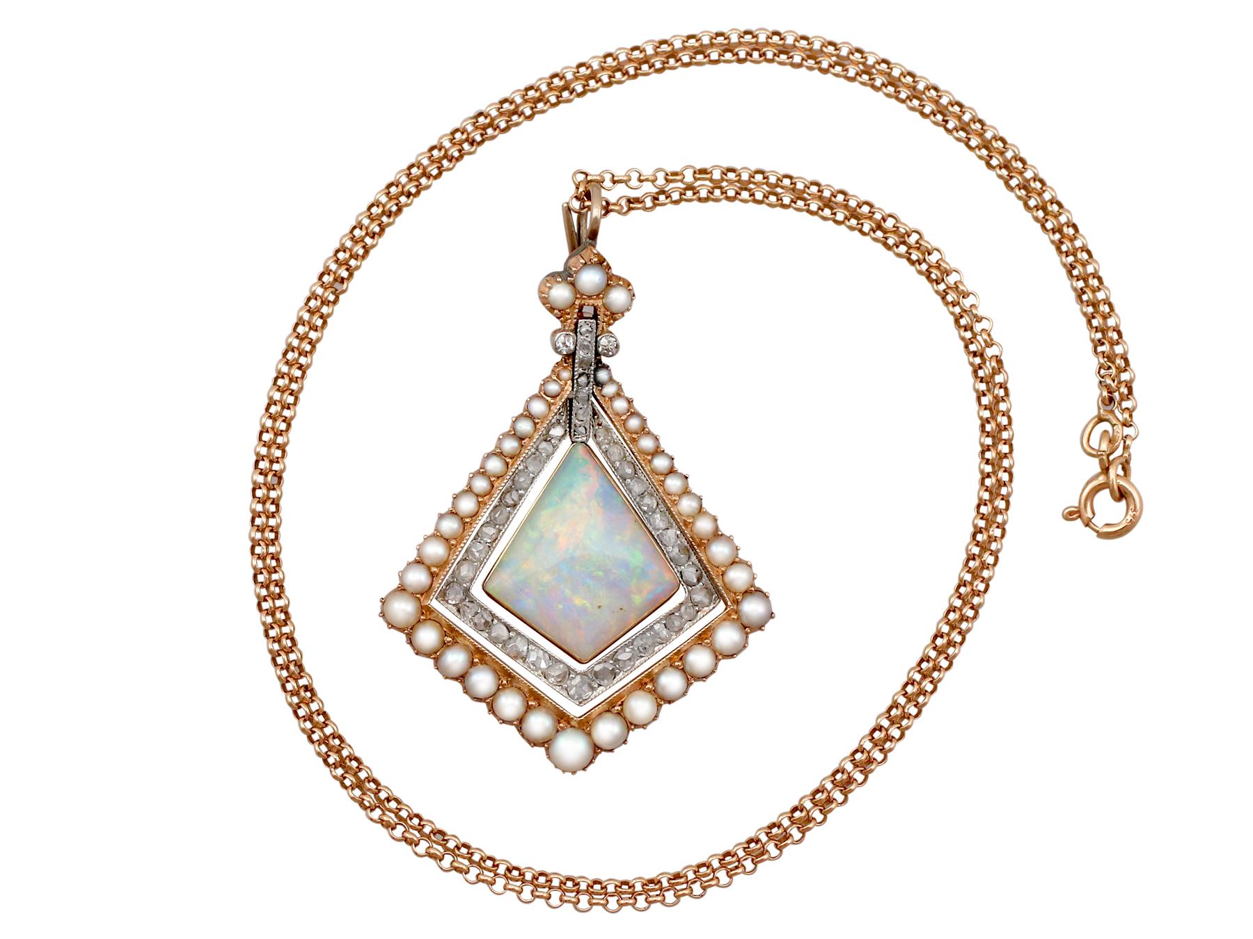 A stunning antique 2.88 carat opal and 0.84 carat diamond, seed pearl and 15 karat yellow and white gold pendant with 9 karat yellow gold chain; part of our diverse antique jewelry collections.

This stunning, fine and impressive pearl has been