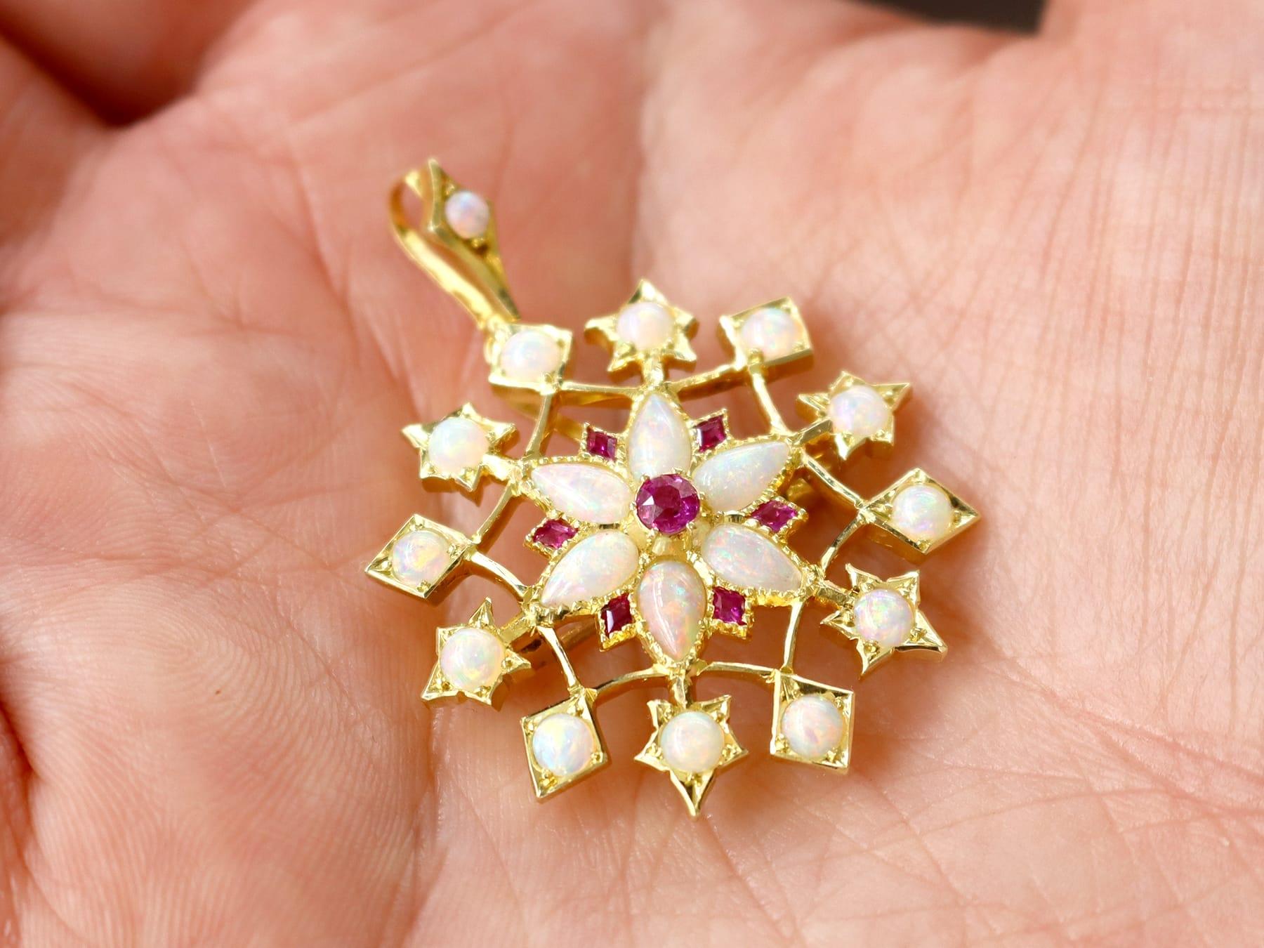 Taille cabochon Antique 2.90ct Opal 0.25ct Ruby and 15ct Yellow Gold Pendant / Brooch Circa 1900 en vente