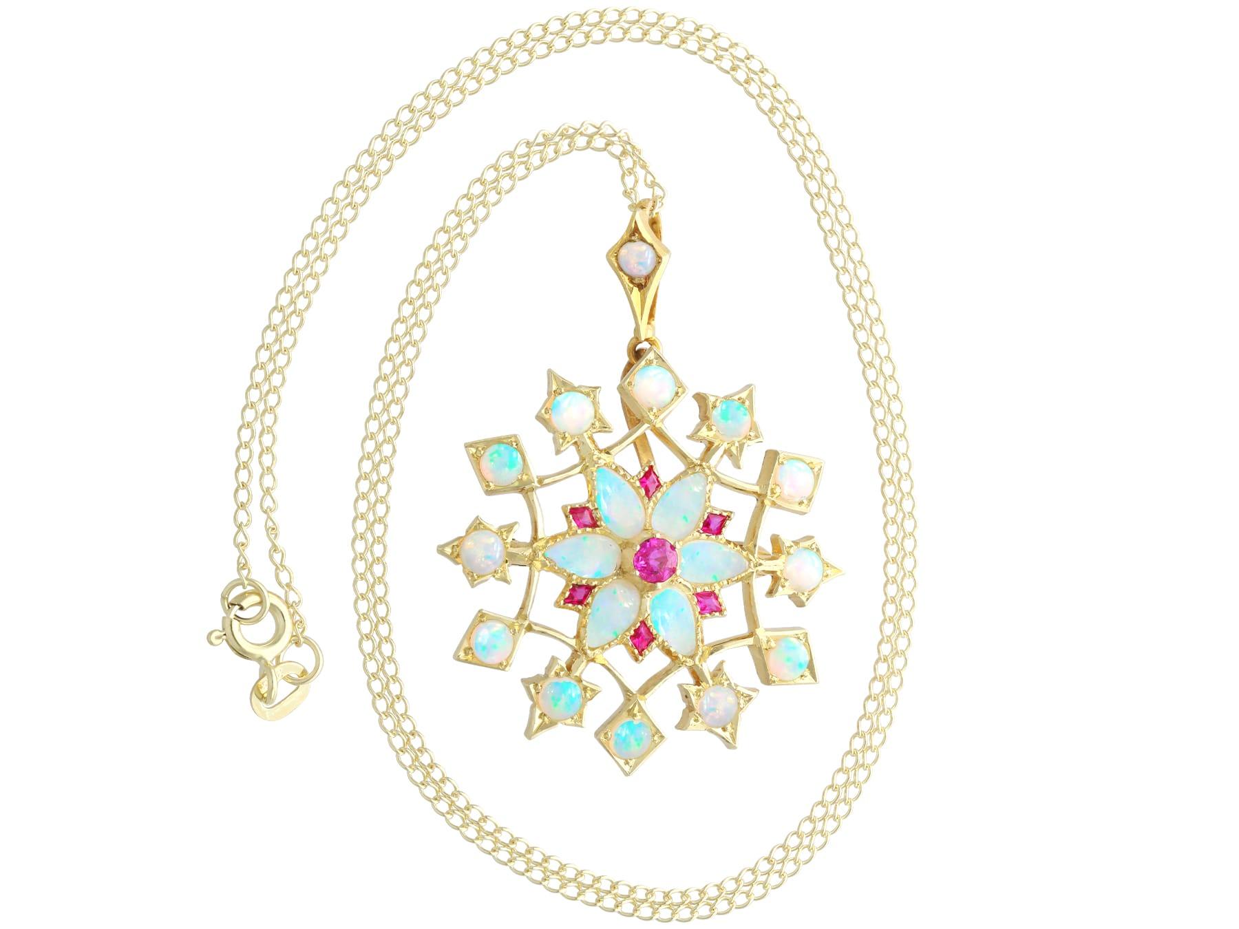 Antique 2.90ct Opal 0.25ct Ruby and 15ct Yellow Gold Pendant / Brooch Circa 1900 Unisexe en vente