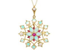 Antique 2.90ct Opal 0.25ct Ruby and 15ct Yellow Gold Pendant / Brooch Circa 1900