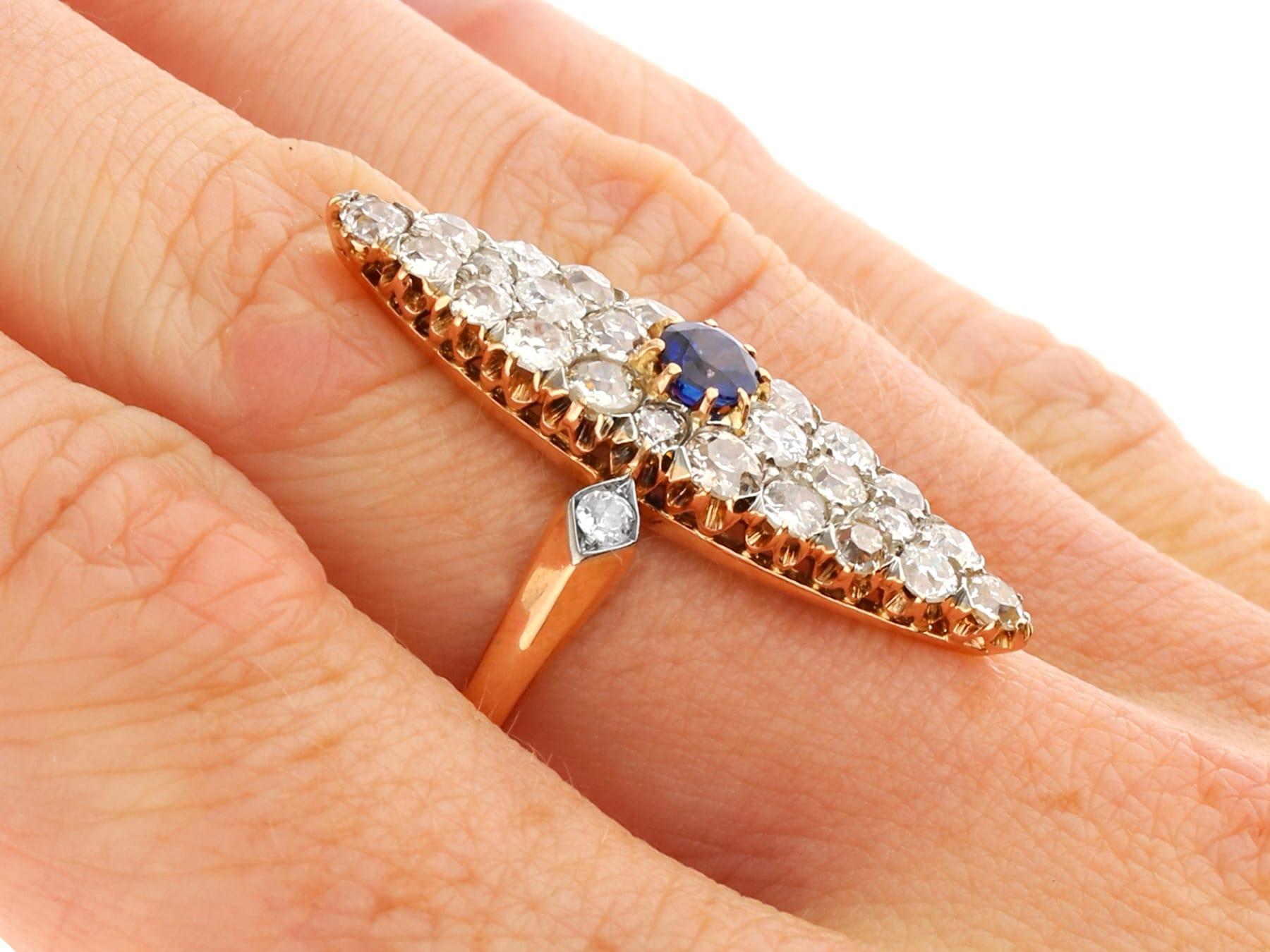 Women's or Men's Antique 2.92 Carat Diamond and Sapphire Yellow Gold Marquise Ring For Sale