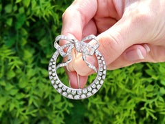 Antique 2.95Ct Diamond and Platinum Crescent Bow Brooch Circa 1930
