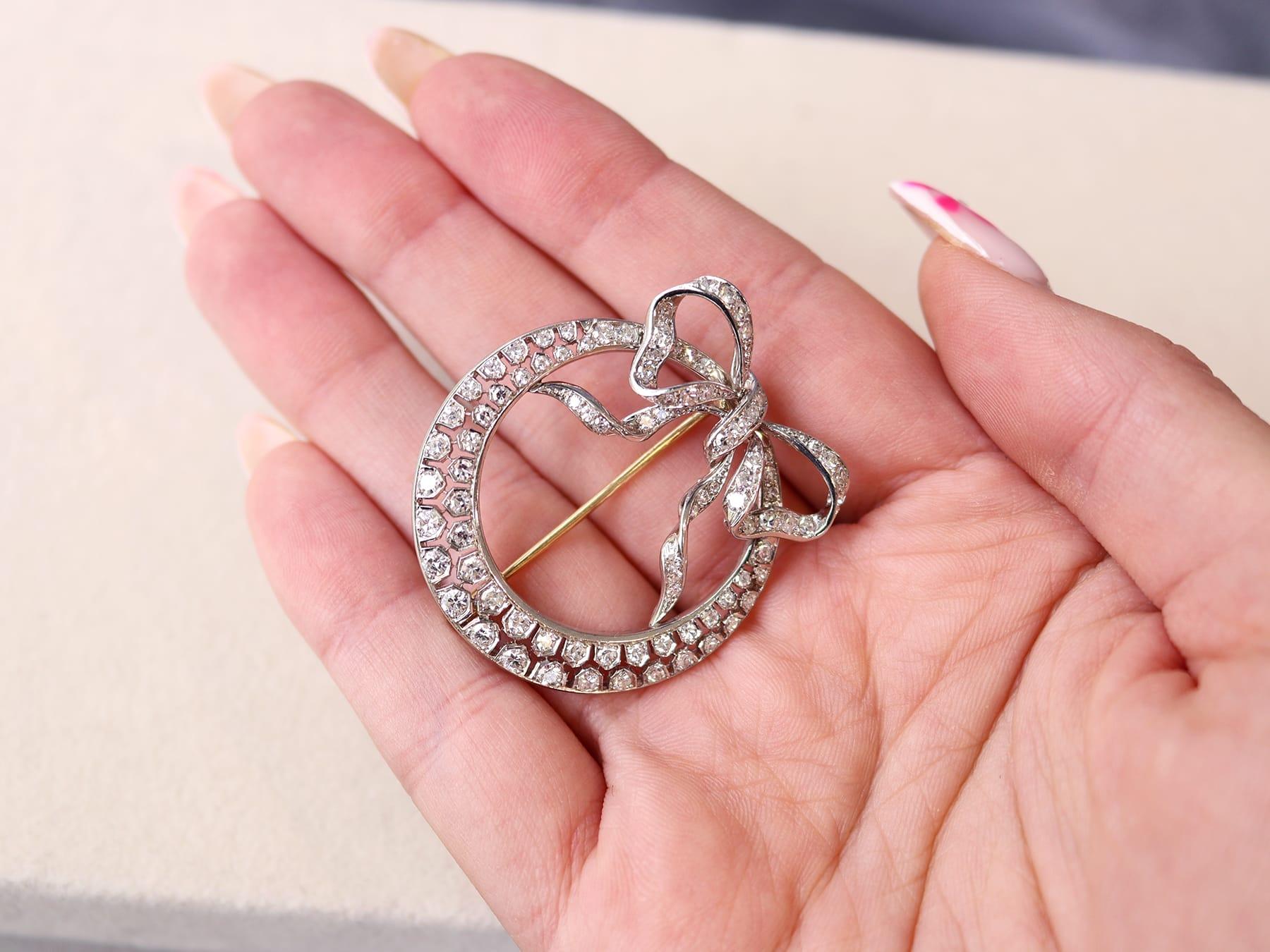 Round Cut Antique 2.95Ct Diamond and Platinum Crescent Bow Brooch Circa 1930 For Sale