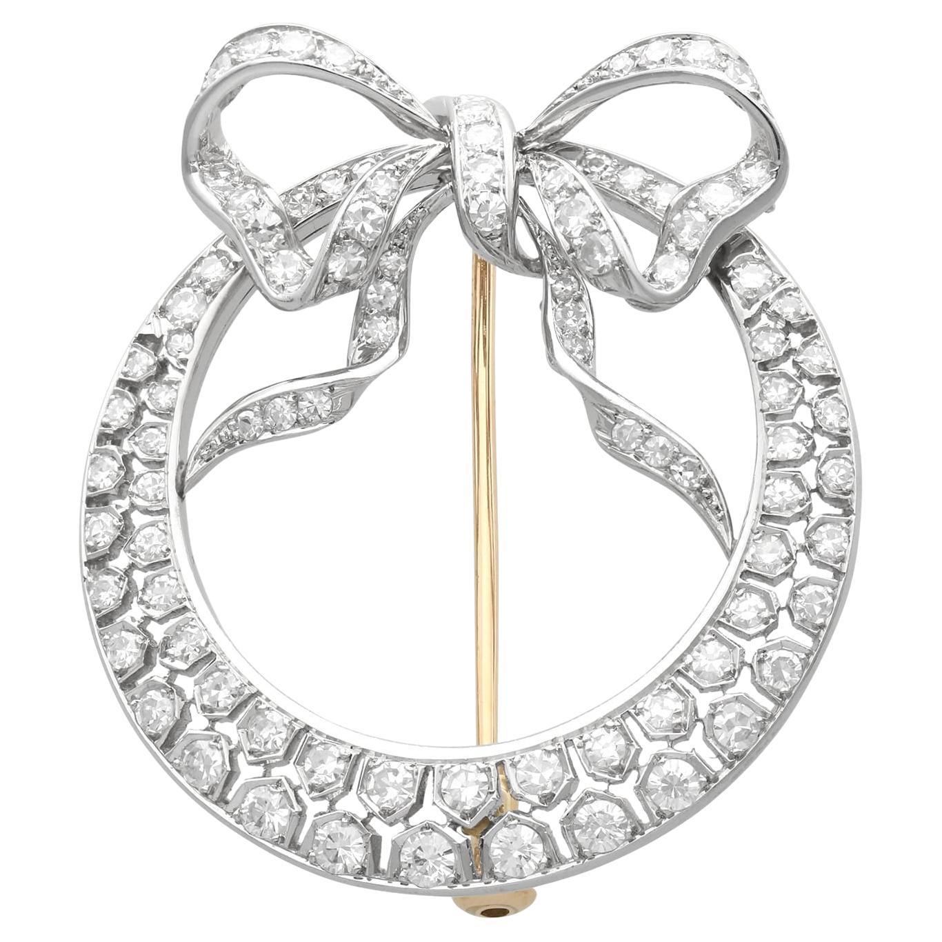 Antique 2.95Ct Diamond and Platinum Crescent Bow Brooch Circa 1930 For Sale