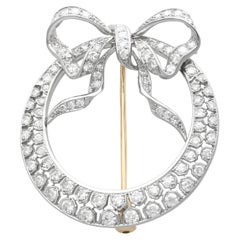 Antique 2.95Ct Diamond and Platinum Crescent Bow Brooch Circa 1930