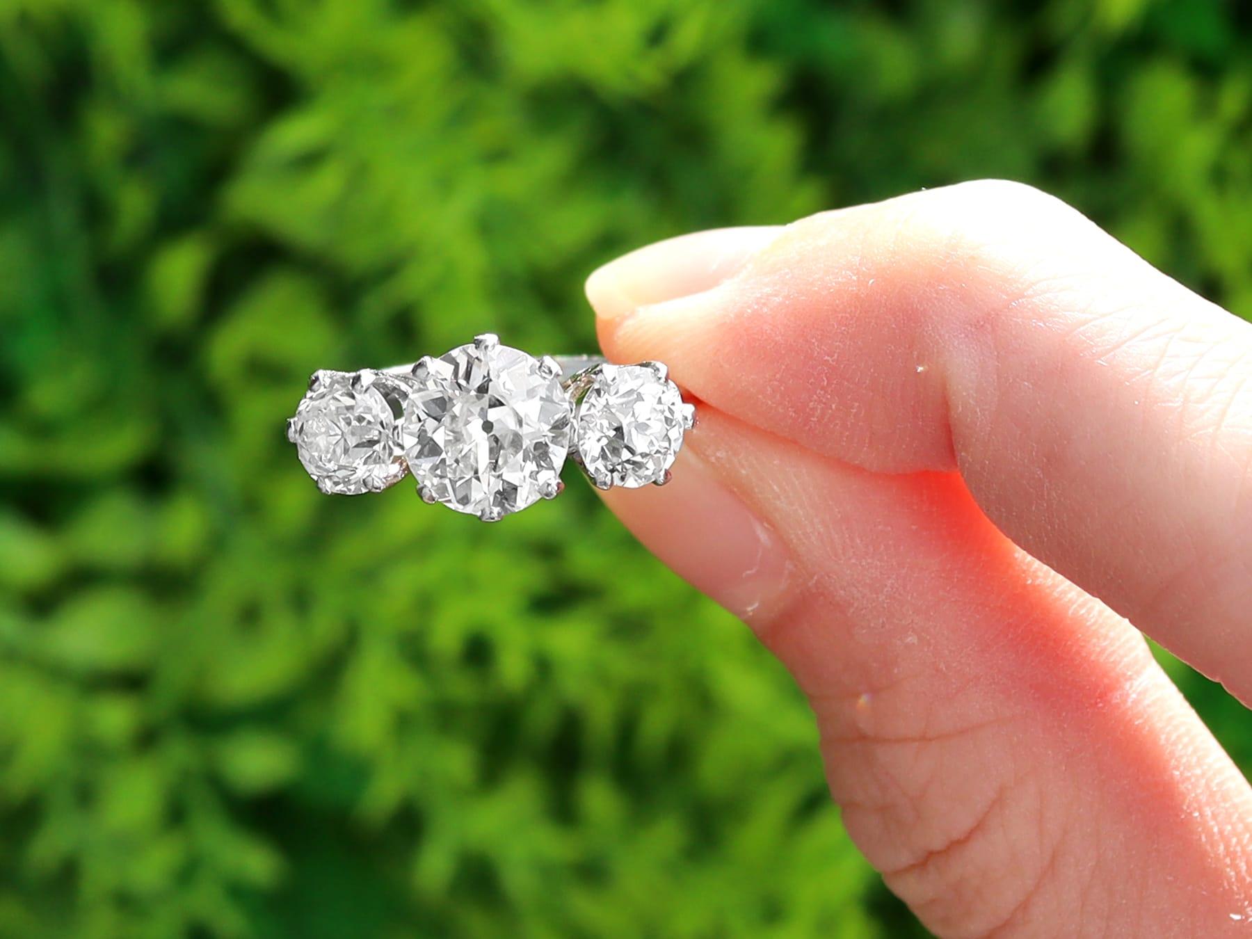 A stunning, fine and impressive antique 2.97 carat diamond and platinum trilogy ring; part of our diverse collection of antique three stone engagement rings.

This stunning, fine and impressive antique trilogy ring has been crafted in platinum.

The