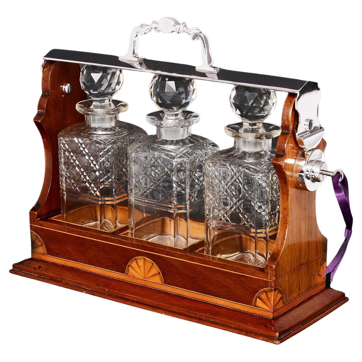 Two Decanter Tantalus In Solid Oak Frame With Brass Fittings