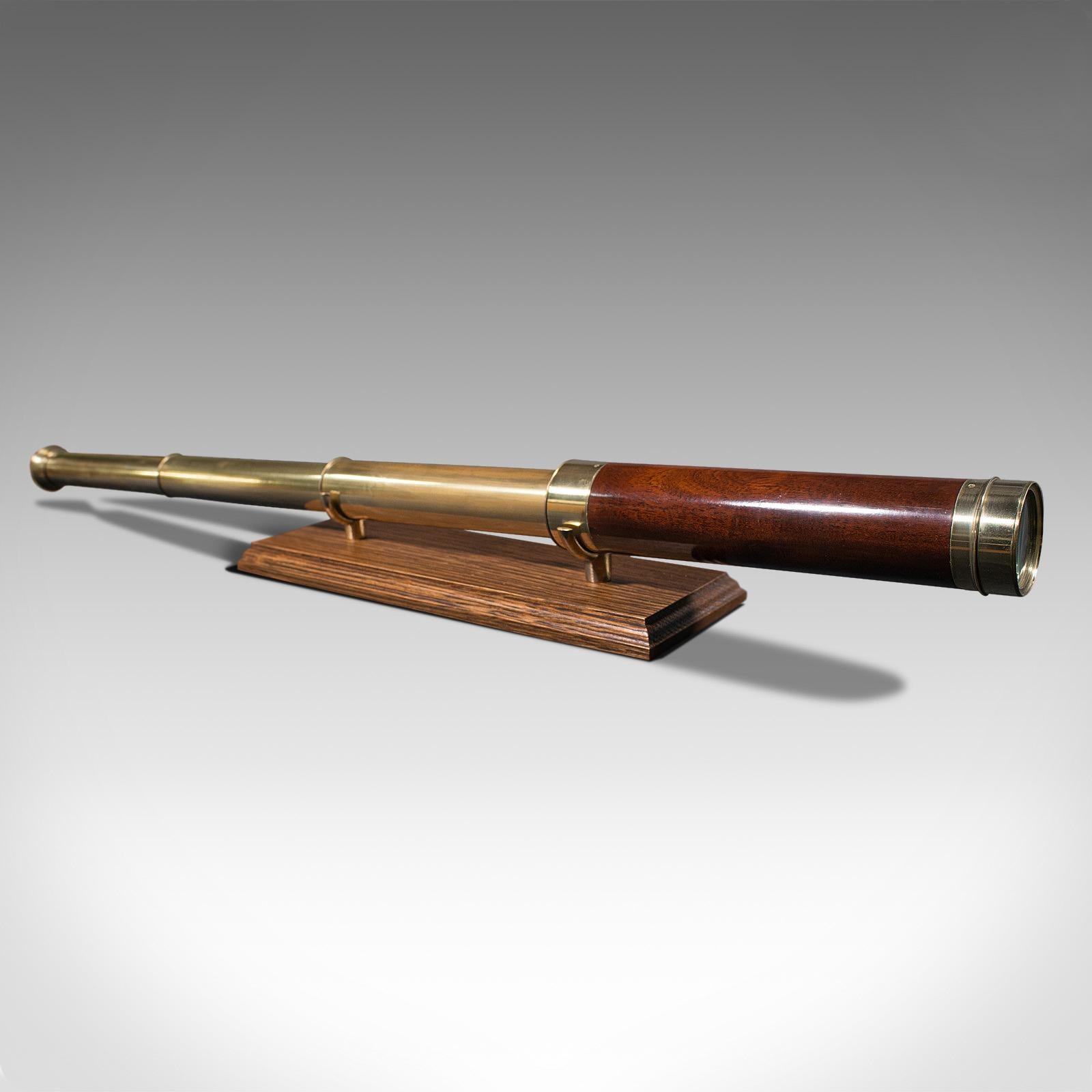 This is an antique 3-draw telescope. An English, mahogany and brass terrestrial and astronomical refractor, dating to the Victorian period, circa 1880.

Perfect for bird watching, landscape appreciation, wildlife, or maritime observation. Equally