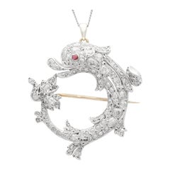 Antique 3.05 Carat Diamond and Ruby Dolphin Brooch Pendant