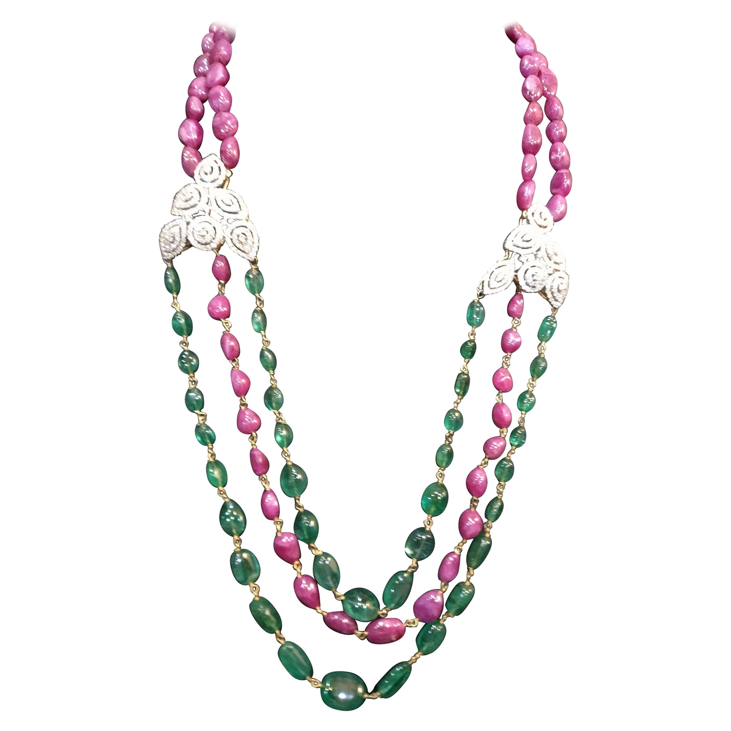 Antique handmade necklace. Really unique with good transparent emerald
200 carats of ruby and 100 carat of emerald beads woven in 18 carat yellow gold
Shoulder part has beautiful diamond patterns made with 10 carat diamonds (5 on each side)
The