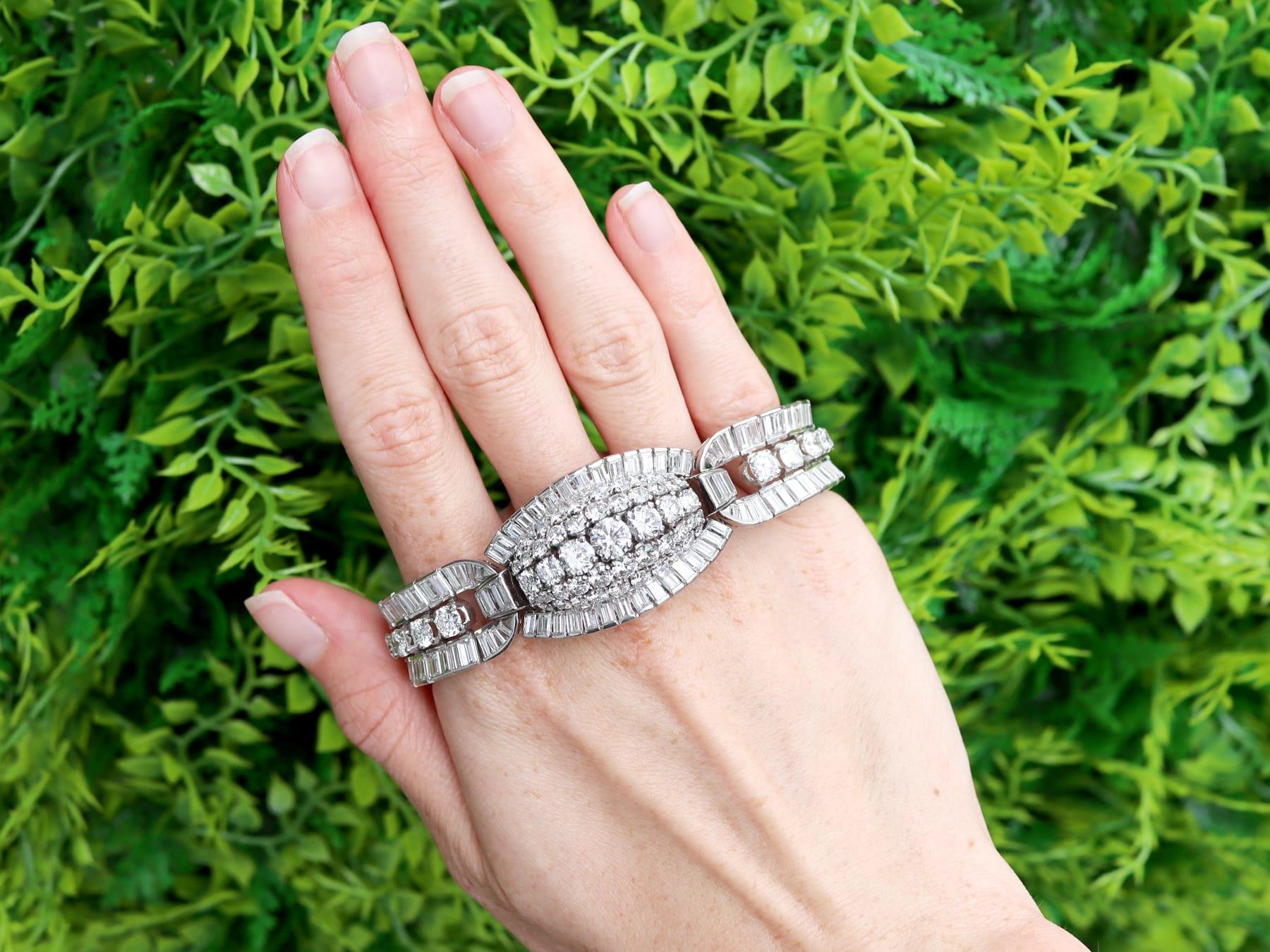 A magnificent, fine and impressive antique art deco 31.54 carat diamond and platinum bracelet; part of our 1920s diamond jewellery collections.

This magnificent, fine and impressive antique 1920s Art Deco bracelet has been crafted in platinum.

The