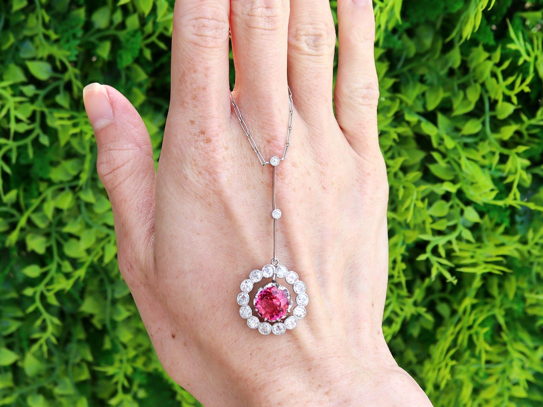 A stunning, fine and impressive antique 3.18 carat pink tourmaline and 2.10 carat diamond, platinum cluster pendant; part of our diverse antique tourmaline jewellery collections.

This stunning, fine and impressive antique 1920s antique pendant has