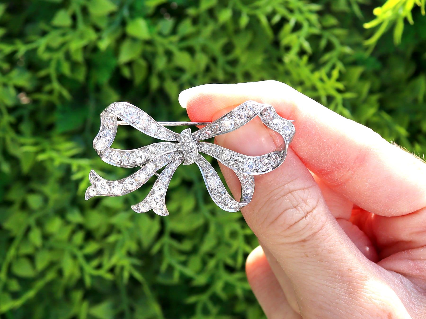 A stunning, fine and impressive 3.30 carat diamond and platinum bow brooch; part of our diverse collection of diamond brooches.

This stunning, fine and impressive antique diamond brooch has been crafted in platinum.

The brooch has been
