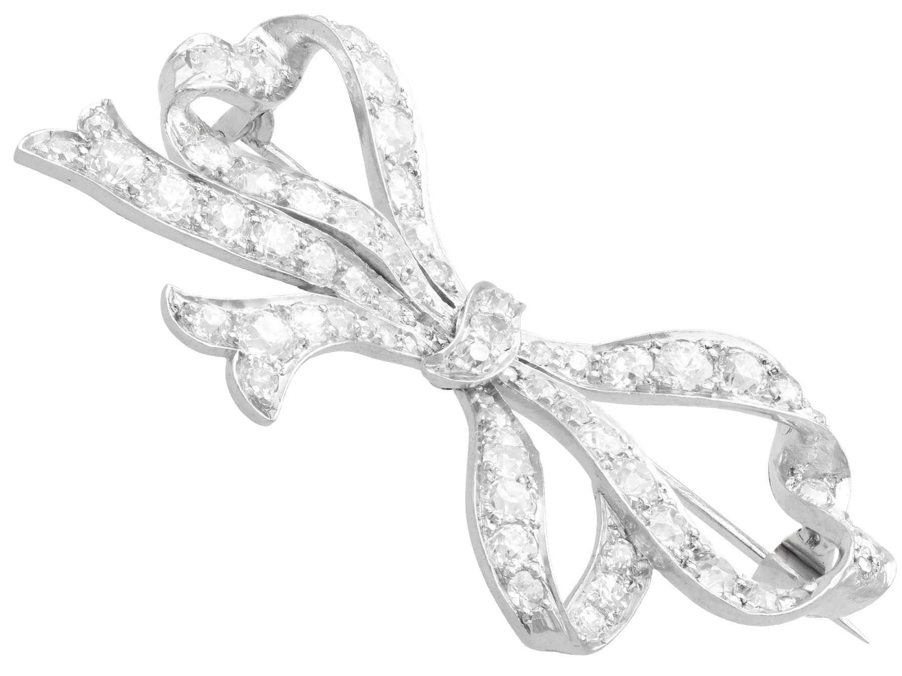 Women's or Men's Antique 3.30Ct Diamond and Platinum Bow Brooch Circa 1915