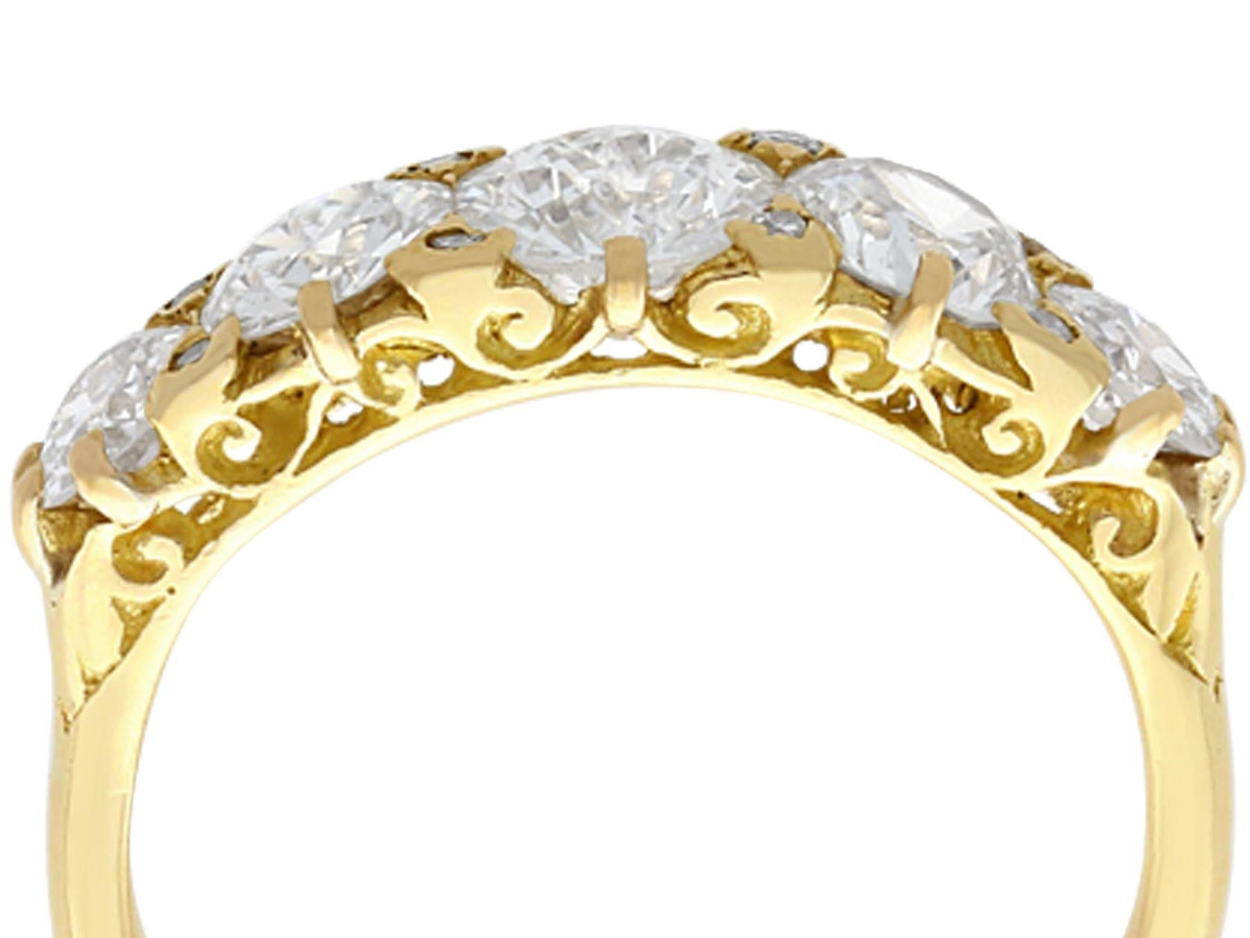 A stunning, fine and impressive antique 3.31 carat diamond and 18 karat yellow gold five stone ring; part of our antique jewelry and estate jewelry collections.

This stunning antique five stone diamond ring has been crafted in 18 karat yellow