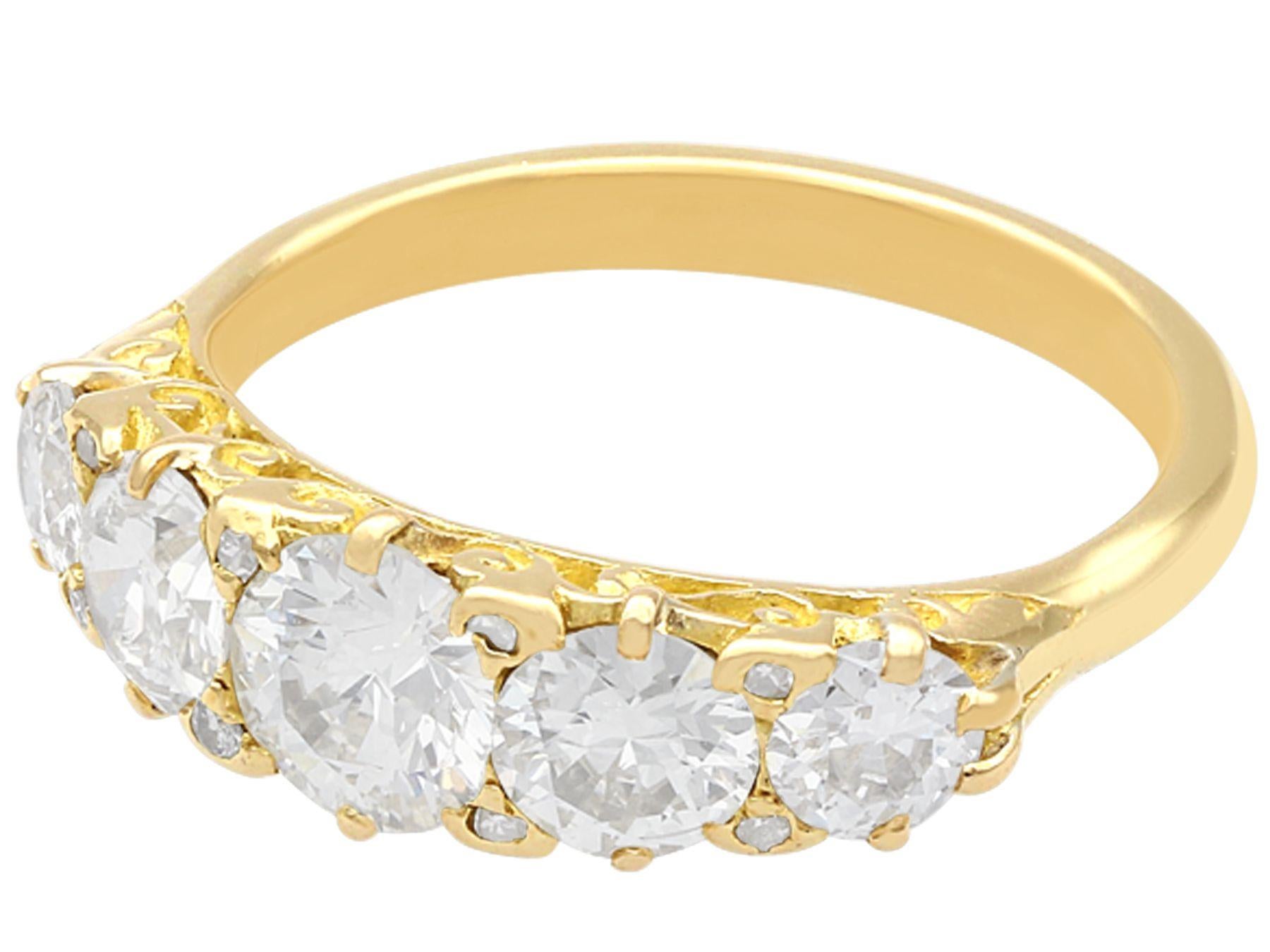 Round Cut Antique 3.31 Carat Diamond and 18k Yellow Gold Five Stone Ring For Sale