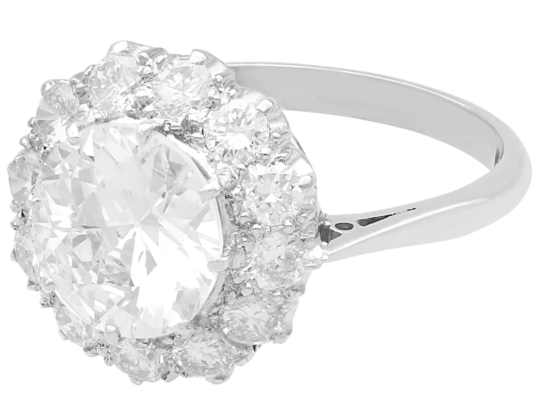 Old European Cut Antique 3.42 carat Diamond and Platinum Cluster Engagement Ring For Sale