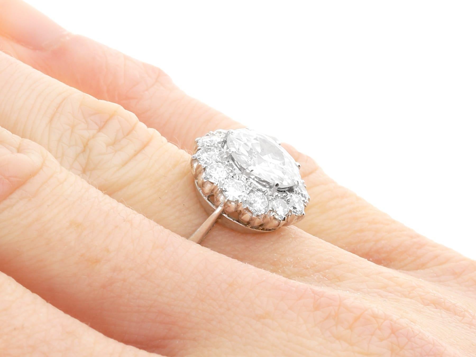 Antique 3.42 carat Diamond and Platinum Cluster Engagement Ring For Sale 3
