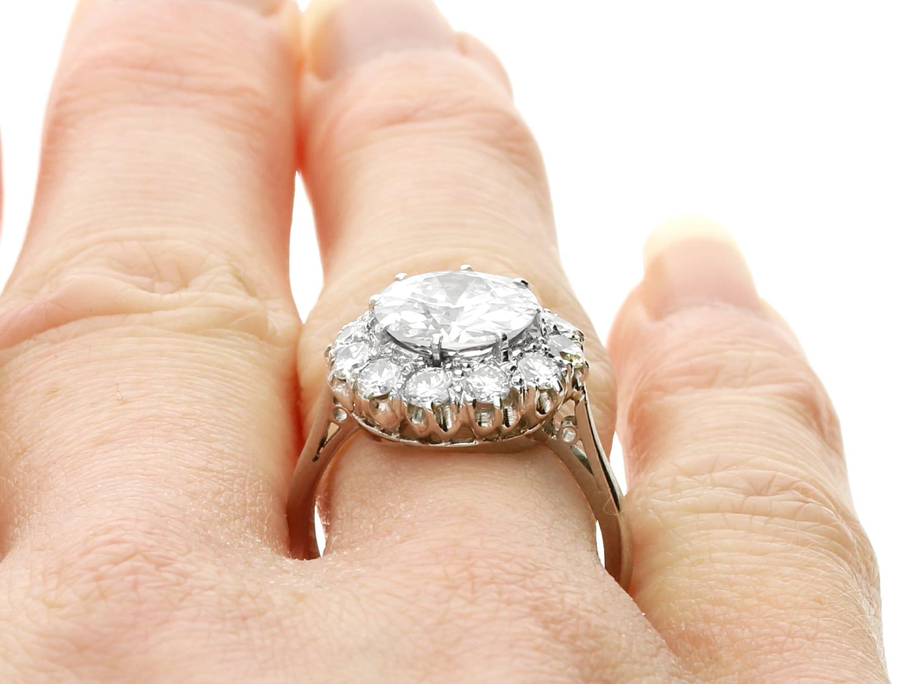 Antique 3.42 carat Diamond and Platinum Cluster Engagement Ring For Sale 4