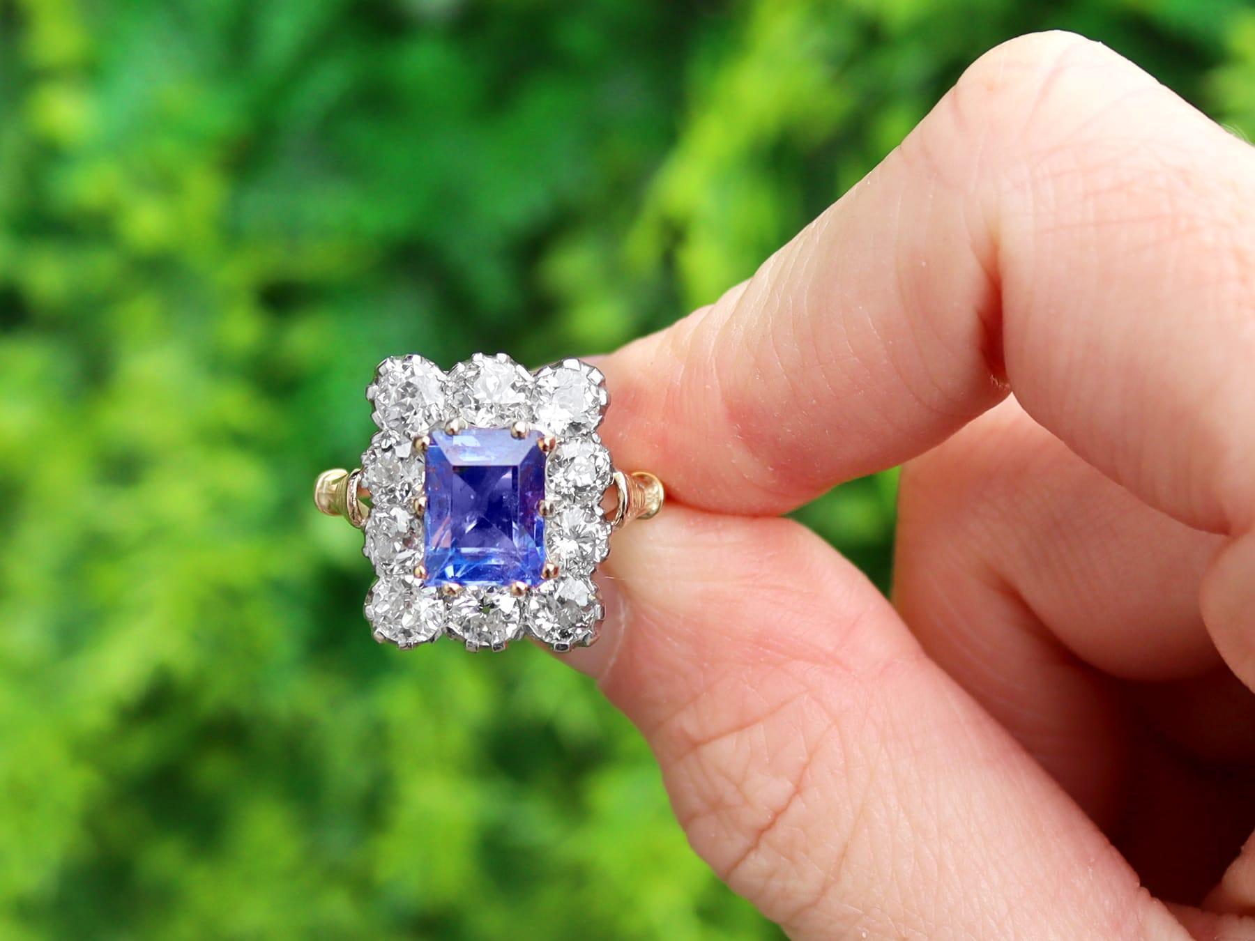 A stunning and impressive antique 3.43 carat Ceylon rectangular step cut sapphire and 2.95 carat diamond, 18 karat yellow gold and 18 karat white gold set cluster ring; part of our diverse antique jewellery and estate jewelry collections.

This
