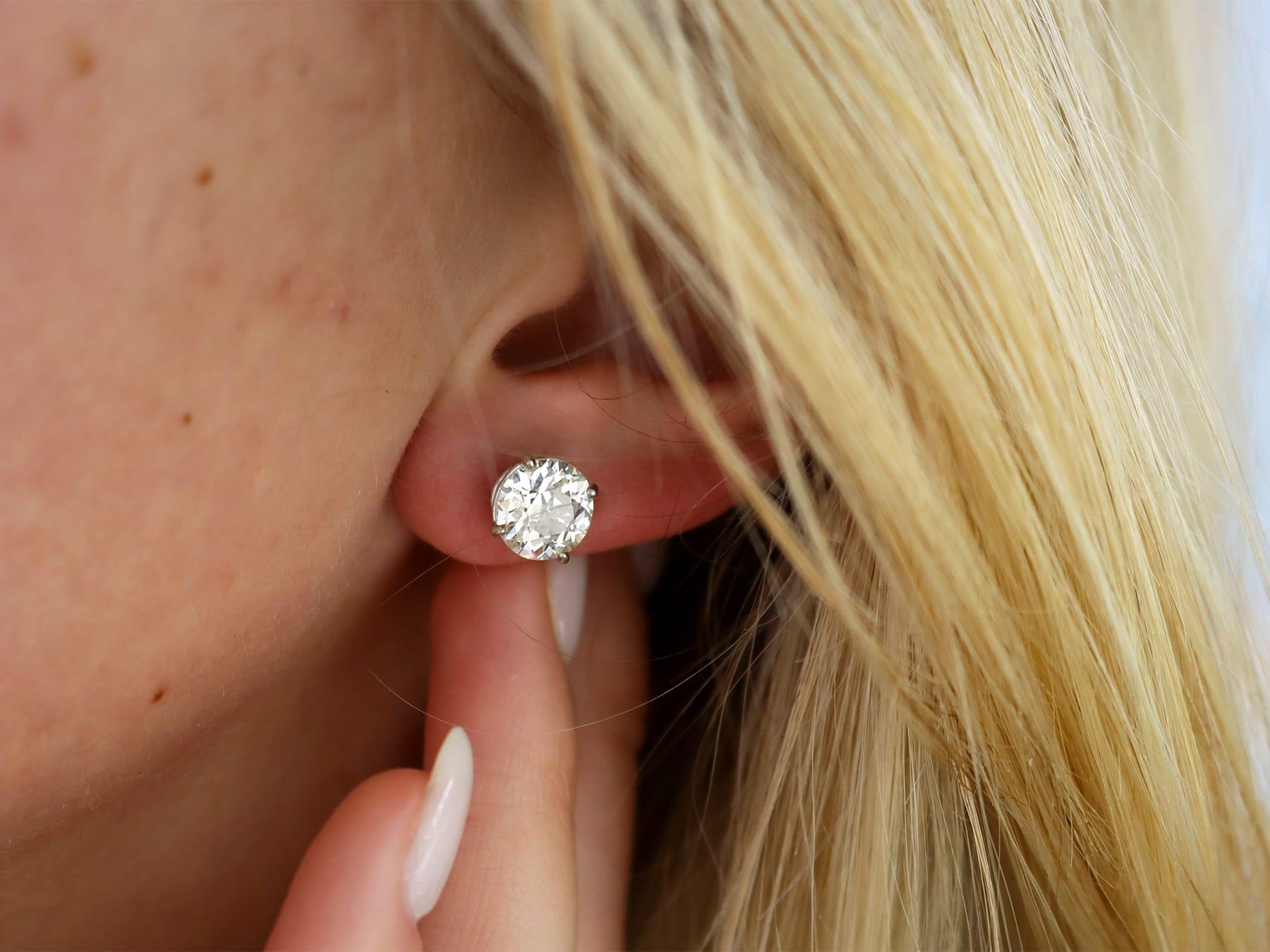 A stunning, fine and impressive pair of antique 3.48 carat diamond and platinum stud earrings; part of our diverse antique diamond jewellery collections.

These stunning, fine and impressive diamond stud earrings have been crafted in platinum.

The