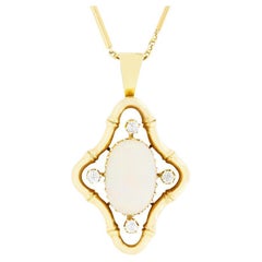 Antico ciondolo con opale e diamanti da 3,50ct, 1900 ca.