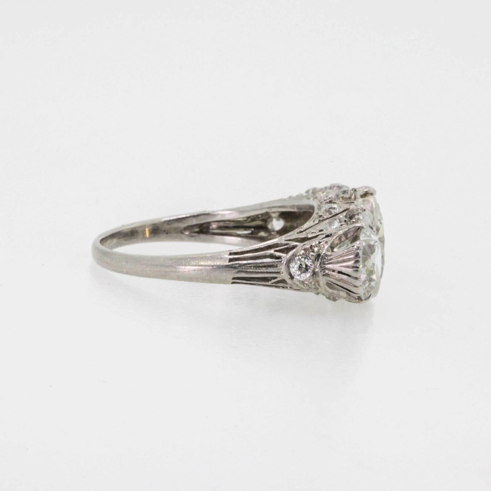 Antique 3.58 Carat Three-Stone Old Cut Diamond Platinum Ring 1