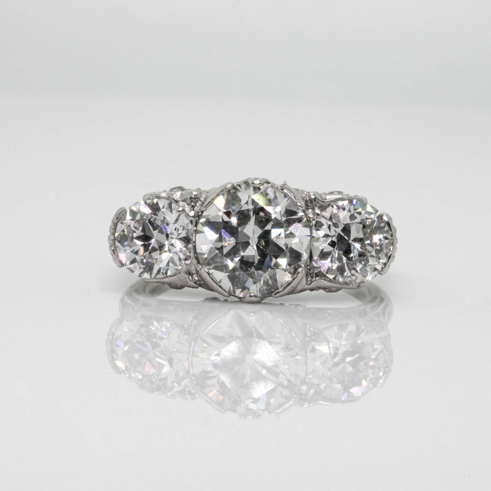 Antique 3.58 Carat Three-Stone Old Cut Diamond Platinum Ring 2