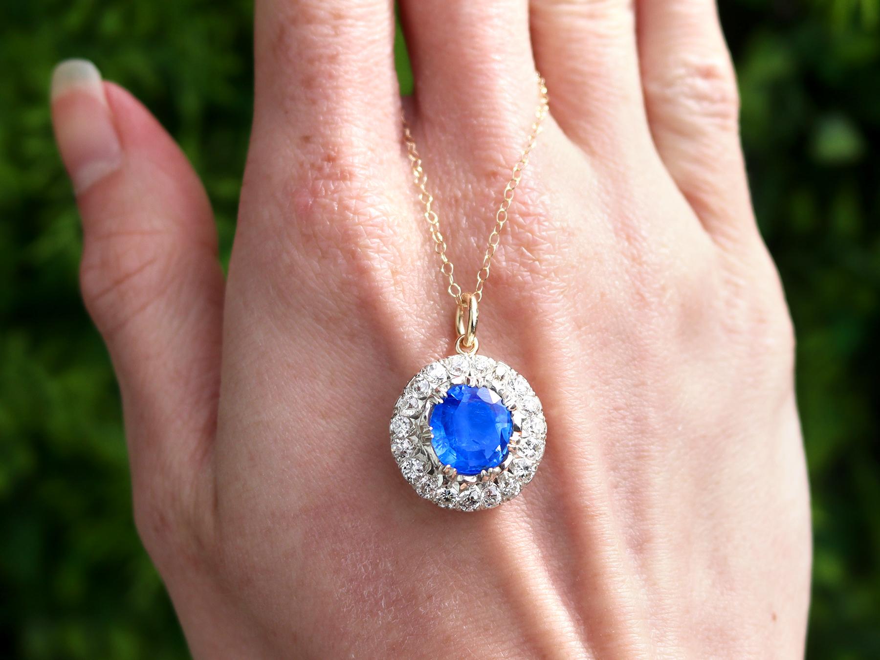 A stunning, fine and impressive 3.58 carat Ceylon blue sapphire and 2.02 carat diamond, 15 karat yellow gold and silver set pendant; an addition to our antique jewelry and estate jewelry collections.

This stunning, fine and impressive antique