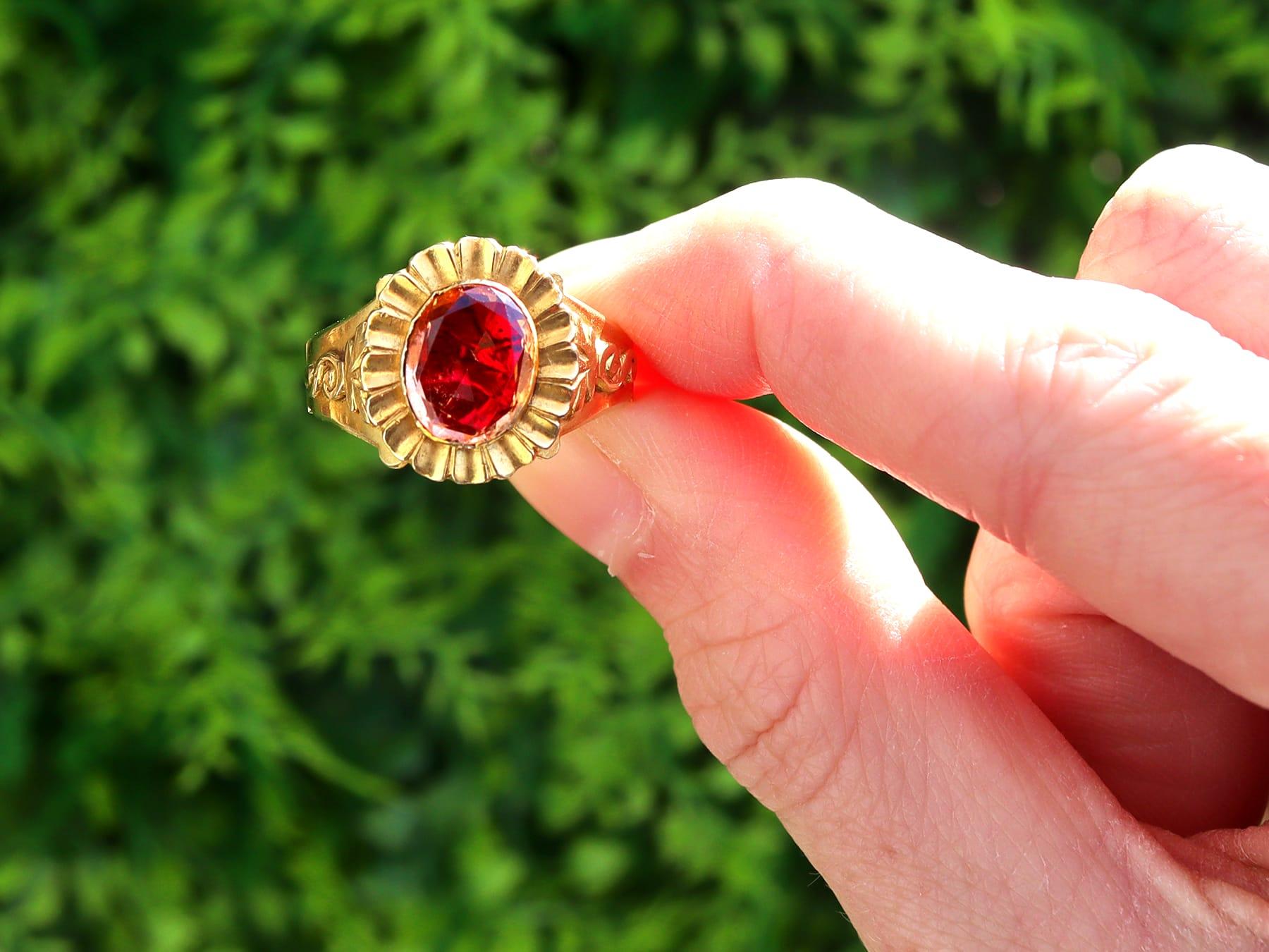 A fine and impressive antique 3.71 carat garnet and 18 karat yellow gold dress ring; part of our diverse Victorian jewellery and estate jewelry collections.

This fine and impressive antique garnet ring has been crafted in 18k yellow gold.

The