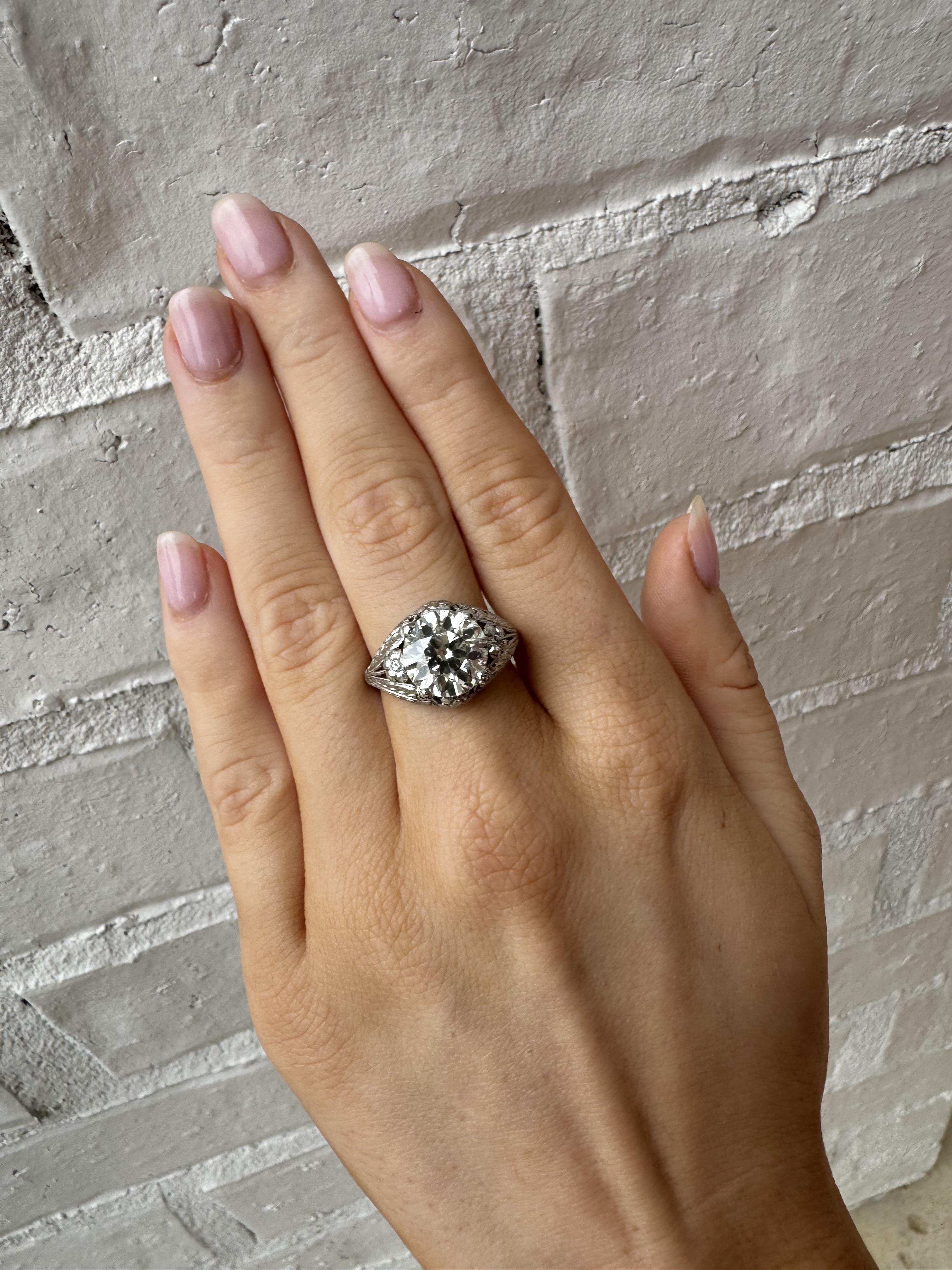 We are thrilled to offer this vintage beauty!!

Ring Details
Material: Platinum
Era: Edwardian 1900 - 1920
Head Width: 13.2mm
Head Height: 6.7mm
Shank Width: 1.5mm
Weight: 6.2 Grams
Finger Size: 7
Sizable Upon Request

Accented by the following