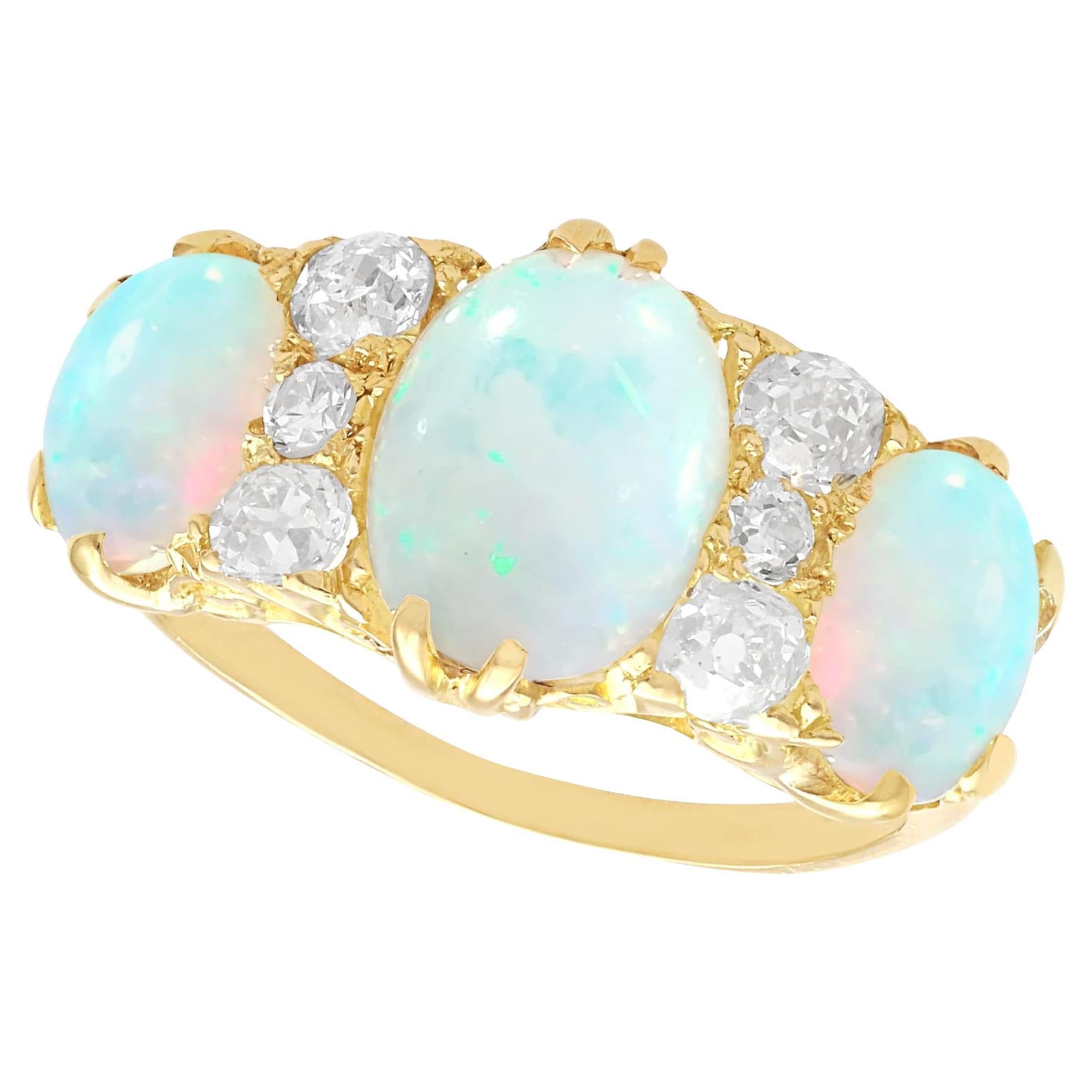 Antique 3.90 Carat Opal and 0.50 Carat Diamond Yellow Gold Trilogy Ring   For Sale