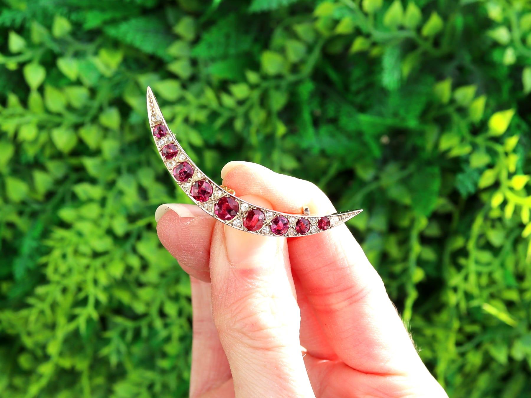 A stunning, fine and impressive 3.95 carat ruby and 0.44 carat diamond and 8 karat yellow gold crescent shaped brooch; part of our diverse Victorian ruby jewellery collections.

This stunning, fine and impressive antique Victorian brooch has been
