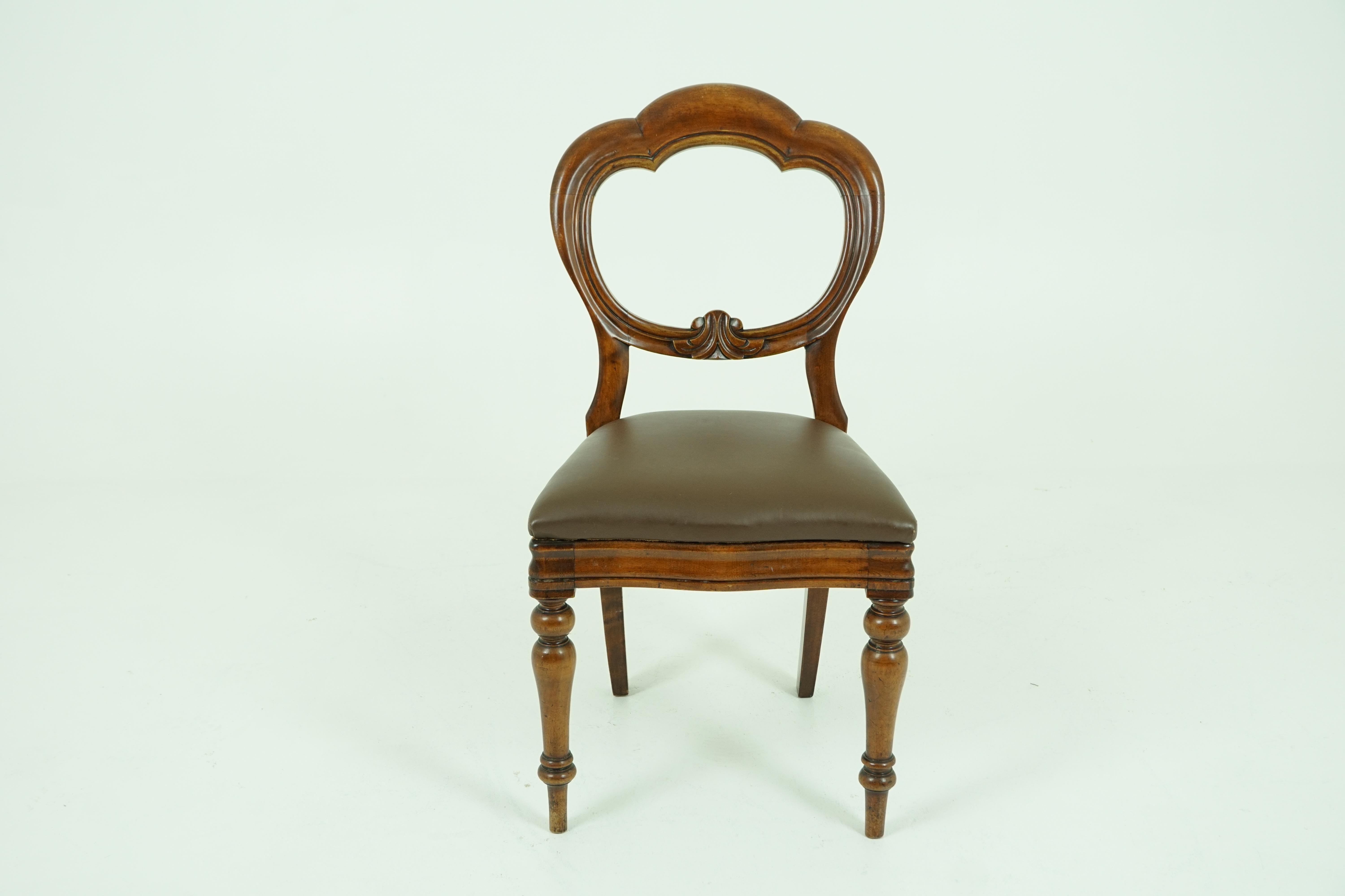 Four antique Victorian walnut balloon back dining chairs

Scotland 1880
Solid walnut
Original finish
Shaped balloon back
With carved lower rail
A serpentine lift out seat
Standing on lovely turned legs
Nice colour and warm patina
All