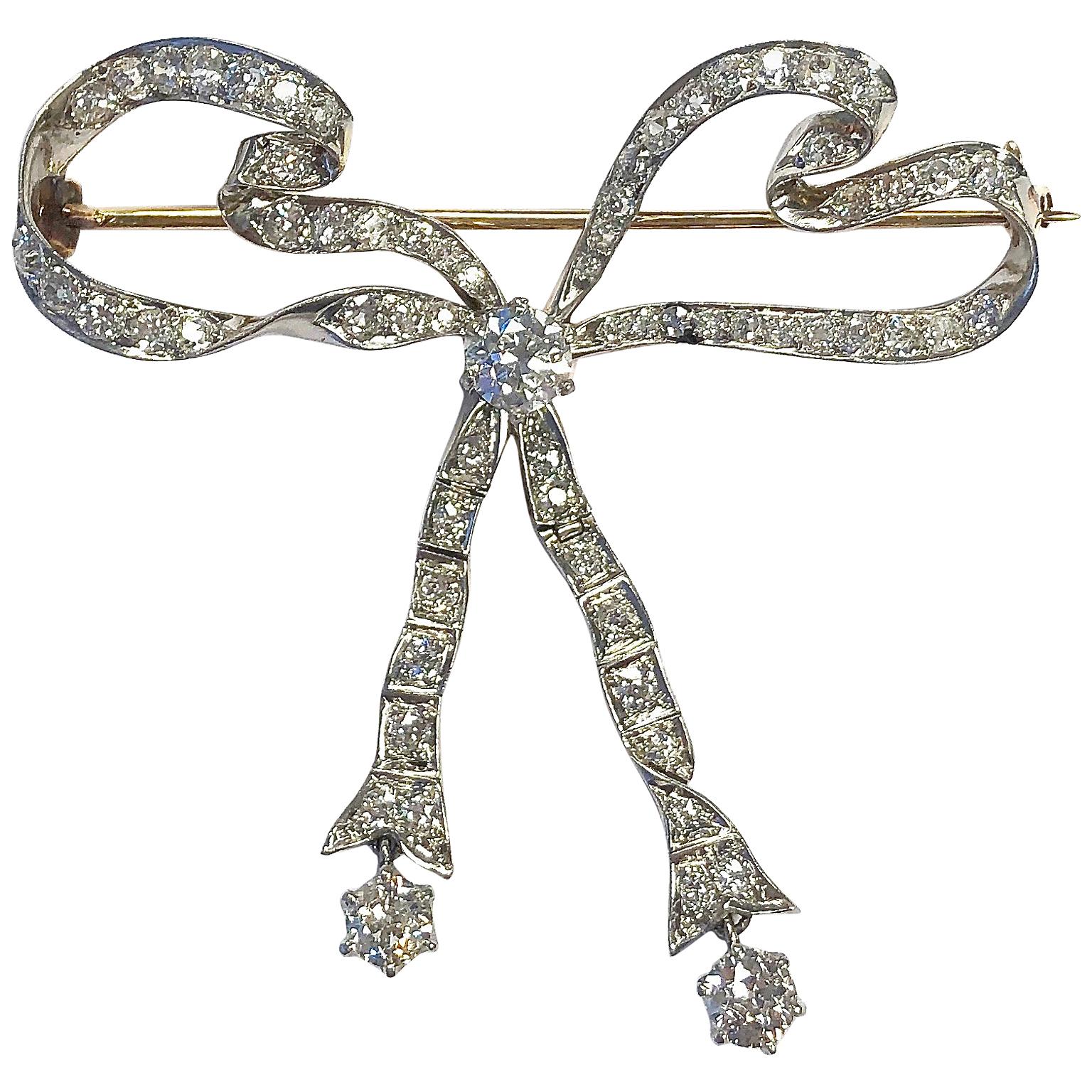 Antique 4 Carat of Diamonds Platinum Gold Articulating Bow Pin For Sale