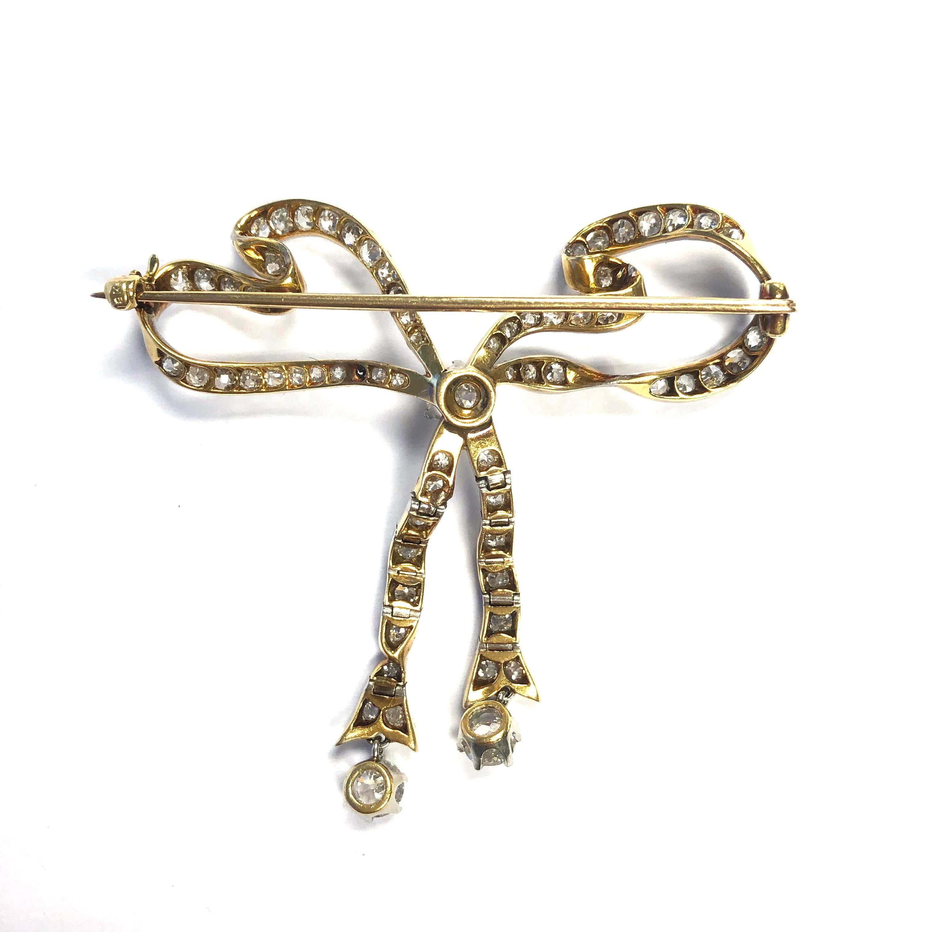 Victorian Antique 4 Carat of Diamonds Platinum Gold Articulating Bow Pin For Sale