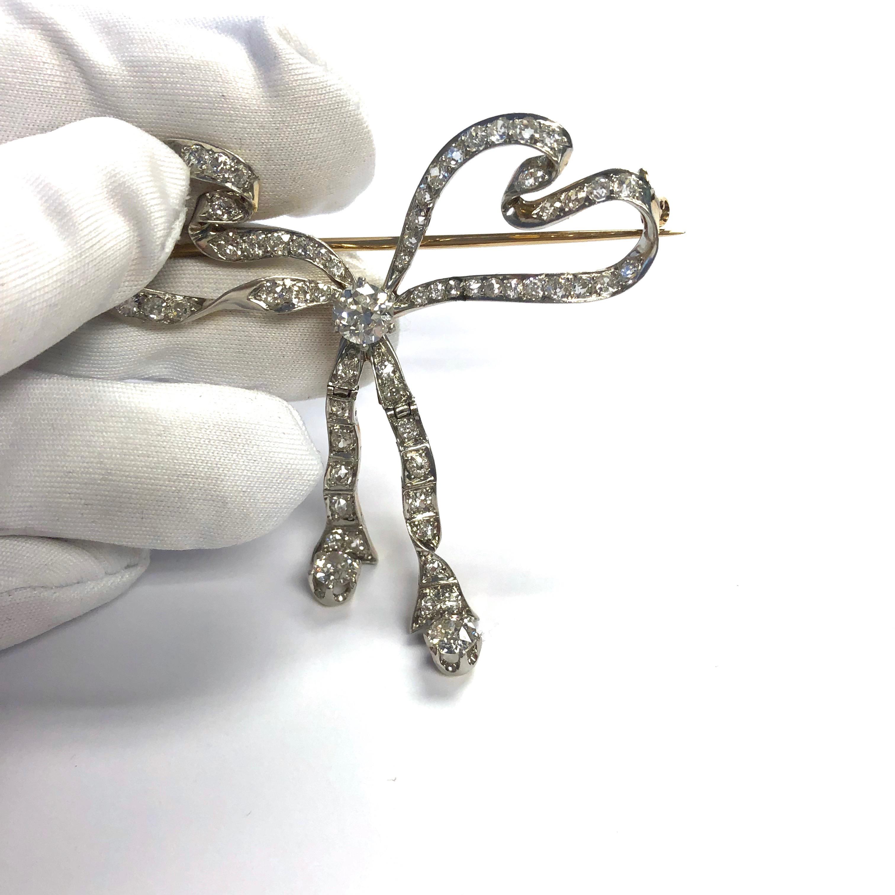 Women's or Men's Antique 4 Carat of Diamonds Platinum Gold Articulating Bow Pin For Sale