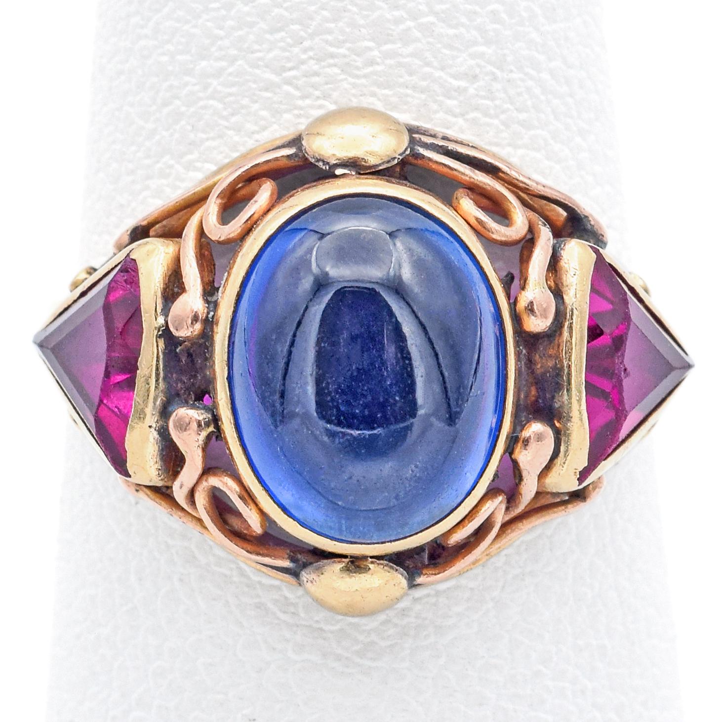 Weight: 4.1 Grams
Stone: 4.06 Ct (10x8x4.7 mm) Lab Sapphire & Ruby (7 x 6 mm)
Face of Ring: 19.0 x 14.5 x 7.0 mm
Size: 6
Hallmark: 14K

ITEM #: BR-1076-101723-19