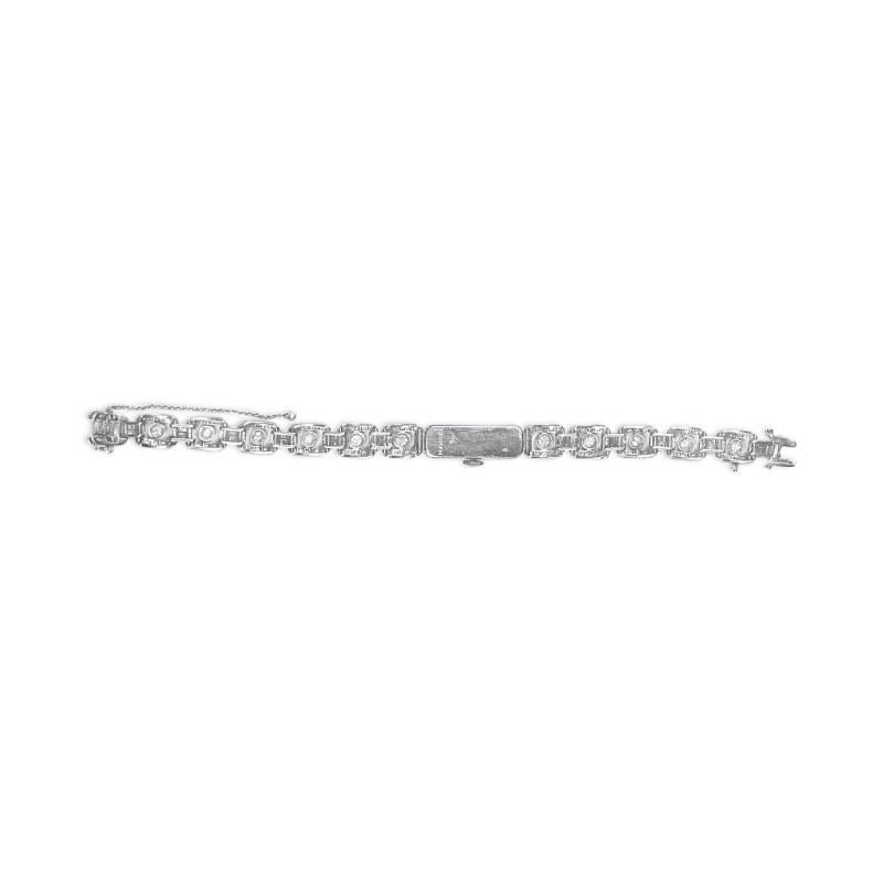 Experience the elegance of the Art Deco era with this antique watch bracelet. Baguette and single-cut diamonds grace the watch face, while hand engravings adorn its sides. The bracelet's links are adorned with old European and single-cut diamonds,